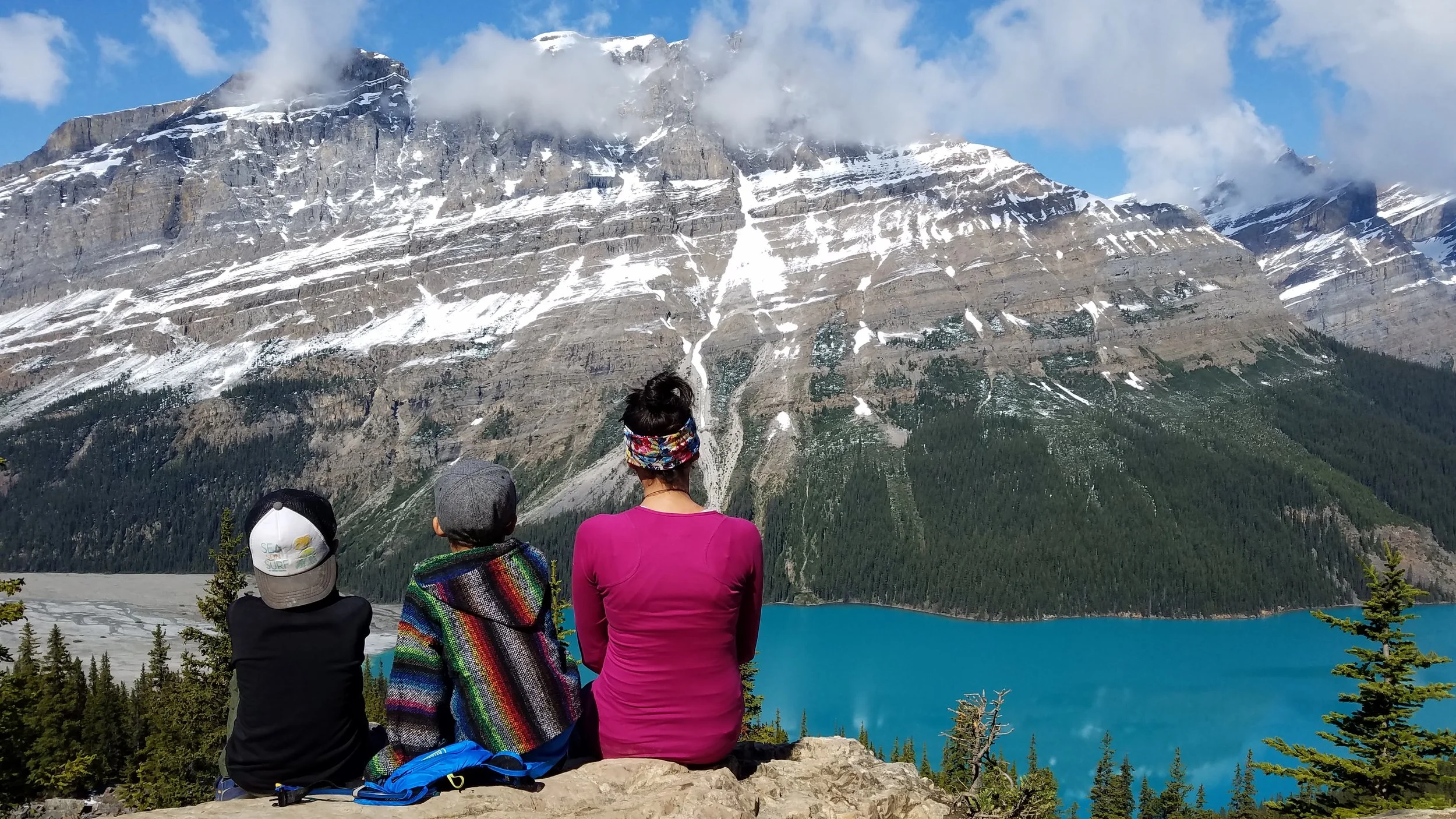 Snacking, staring, and probably crying (me!) while enjoying the views of Peyto Lake.
