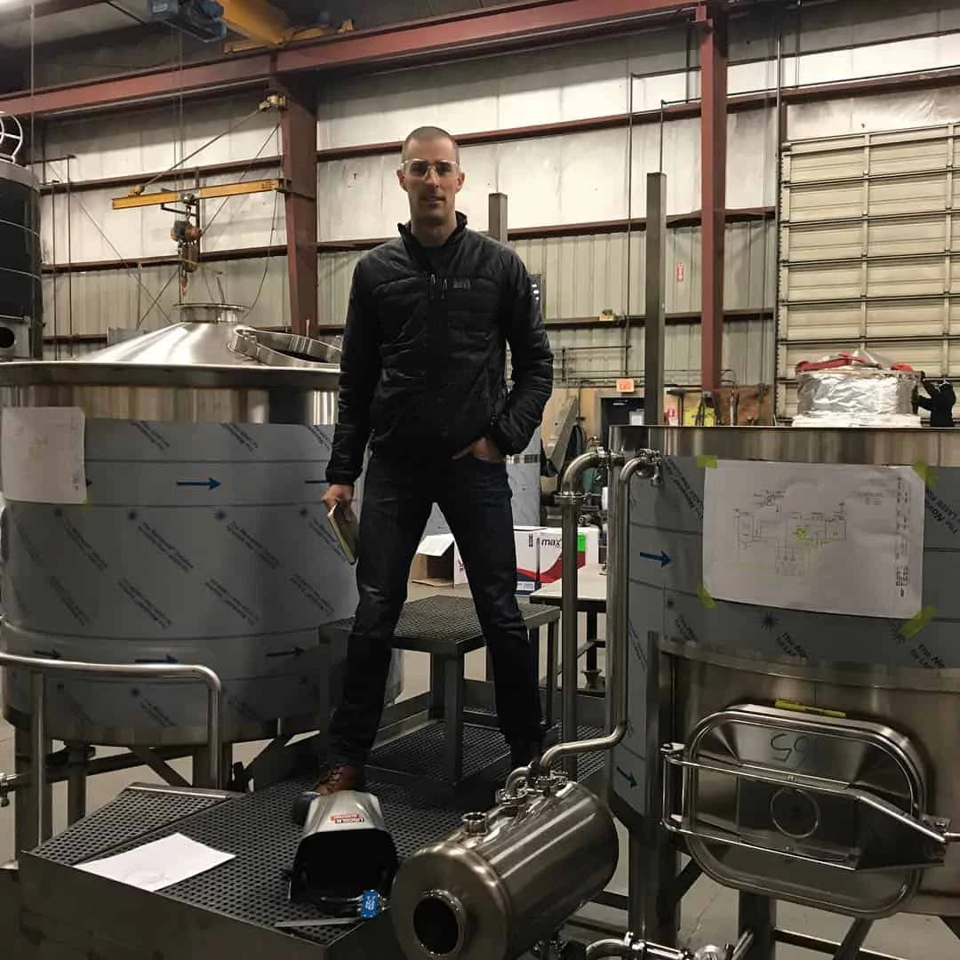 Wade doing a brewhouse inspection prior to shipment.