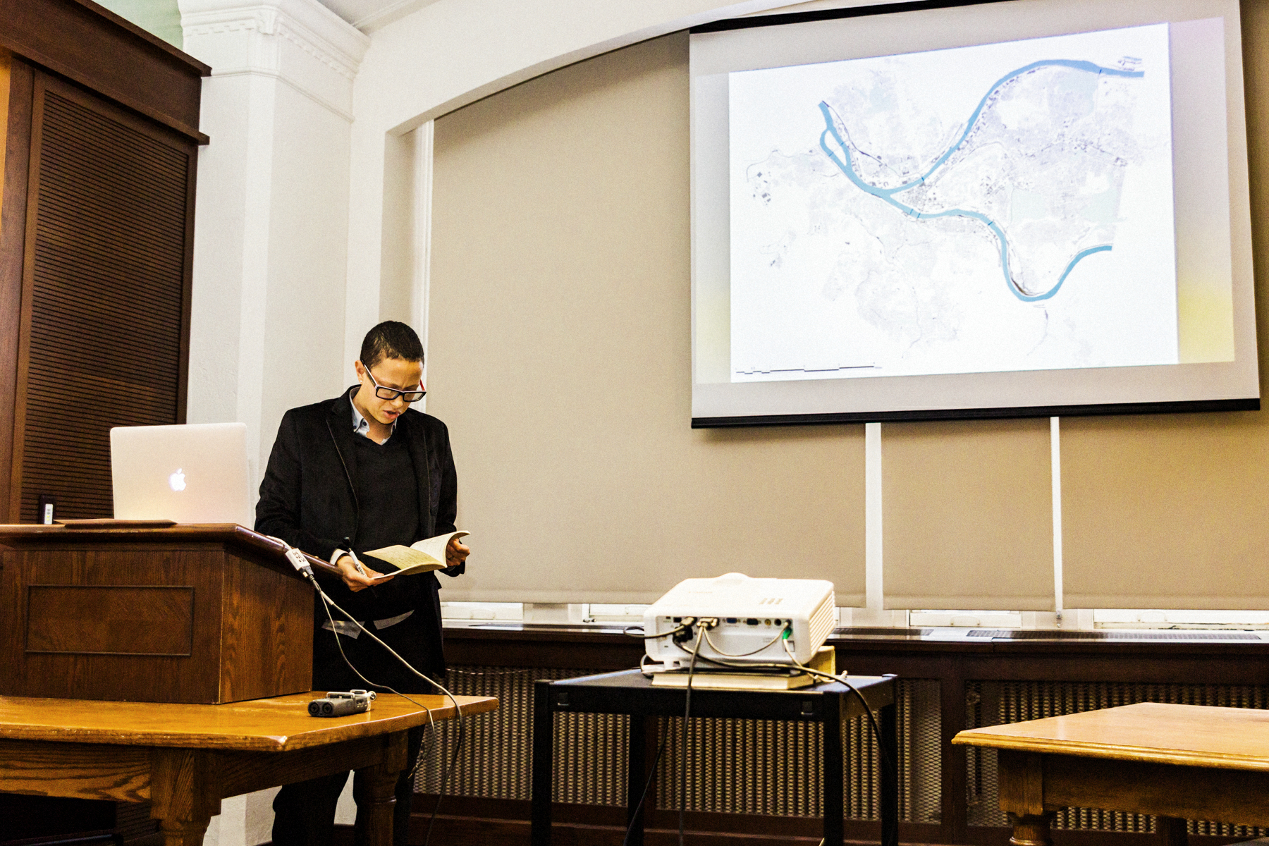 Designer Mitch McEwen speaks at Pittsburgh’s City of Asylum, 2016. Photo by Heather Kresge.