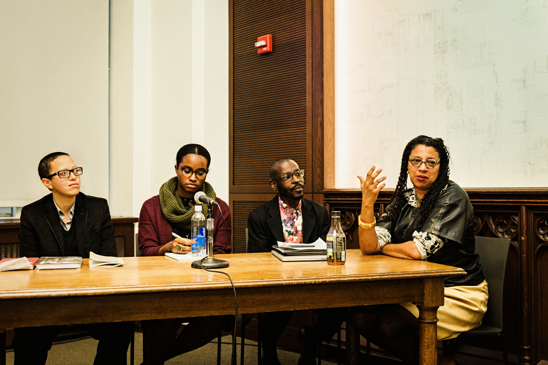 Speakers at the University of Pittsburgh’s “Why Does Black Art Matter Now?” symposium, December 2016. From left to right: designers Mitch McEwen, Imani Day, and Mario Gooden, and poet Robin Coste Lewis. Photo by Heather Kresge.