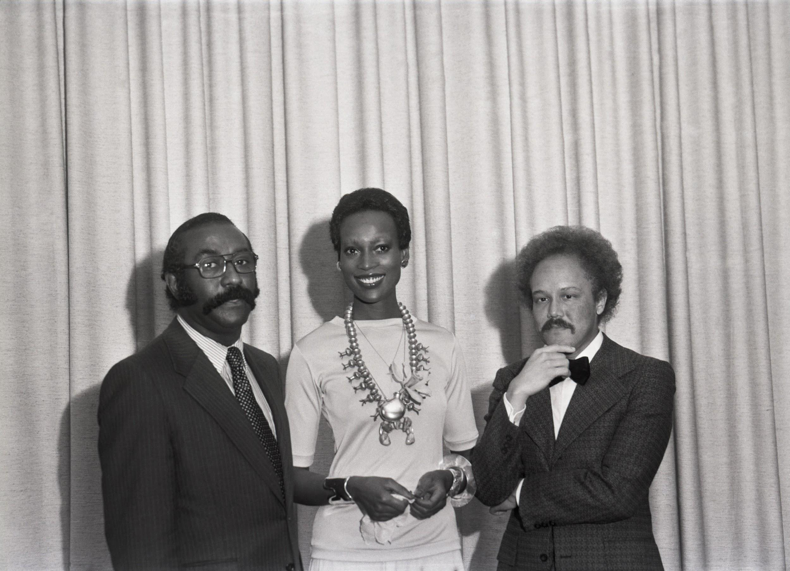 Naomi Sims with Dr. Herman Reed and Alfred Morris at a NEED annual dinner, Pittsburgh, 1965. Photo by Charles Teenie Harris, courtesy of Historic Pittsburgh.