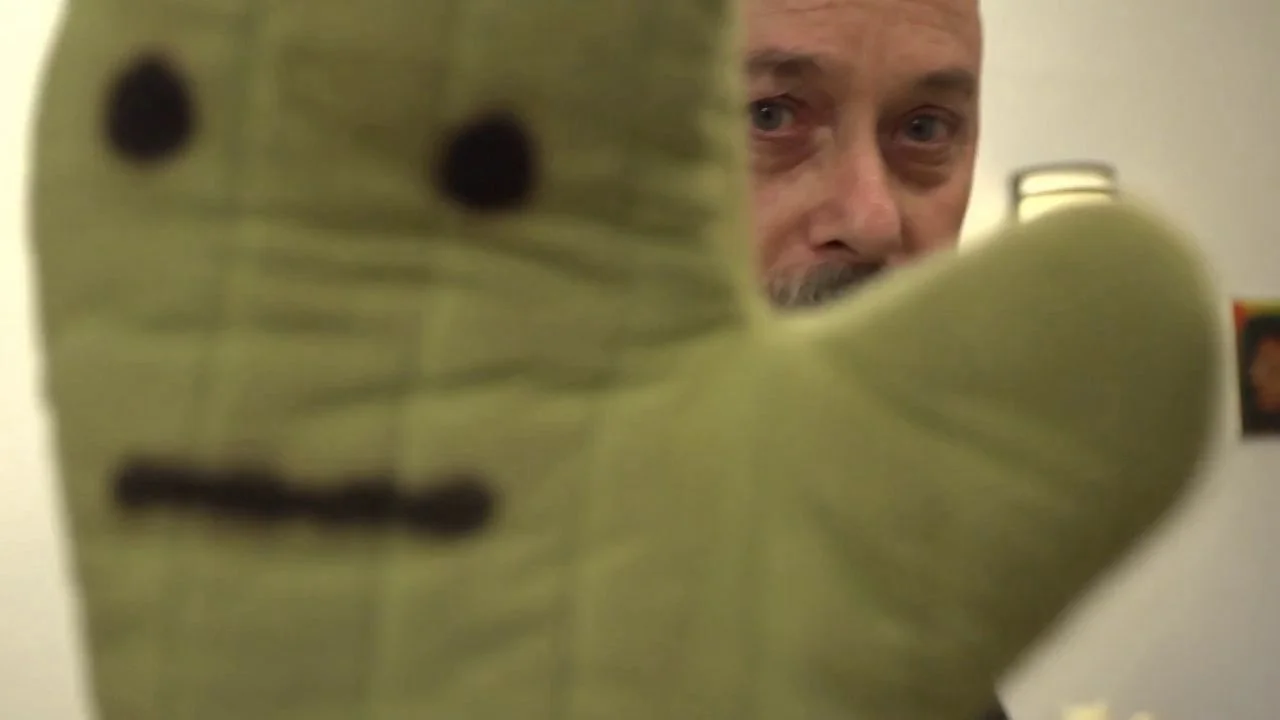 Zelevansky with a puppet, from Paul Zelevansky, Master Visual Artist 2013. Courtesy of Pittsburgh Center for the Arts.