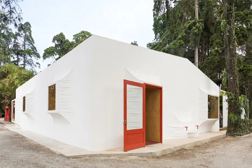 Zona 14 House in Guatemala City takes inspiration from the Spanish Colonial heritage of the area, specifically with the sculptural openings and the thick stucco walls. Reducing the scale of the facade openings adds to both the residential appearance and reduces heat gain on the interior. Courtesy Taller Ken.
