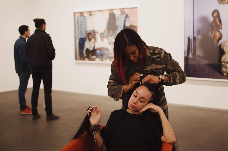 Flow State performed by Shaquille Douglas and Tara Fay (sitting) in the Deana’s Lawson solo exhibition exhibition at the CMoA. Courtesy Sarah Huny Young.