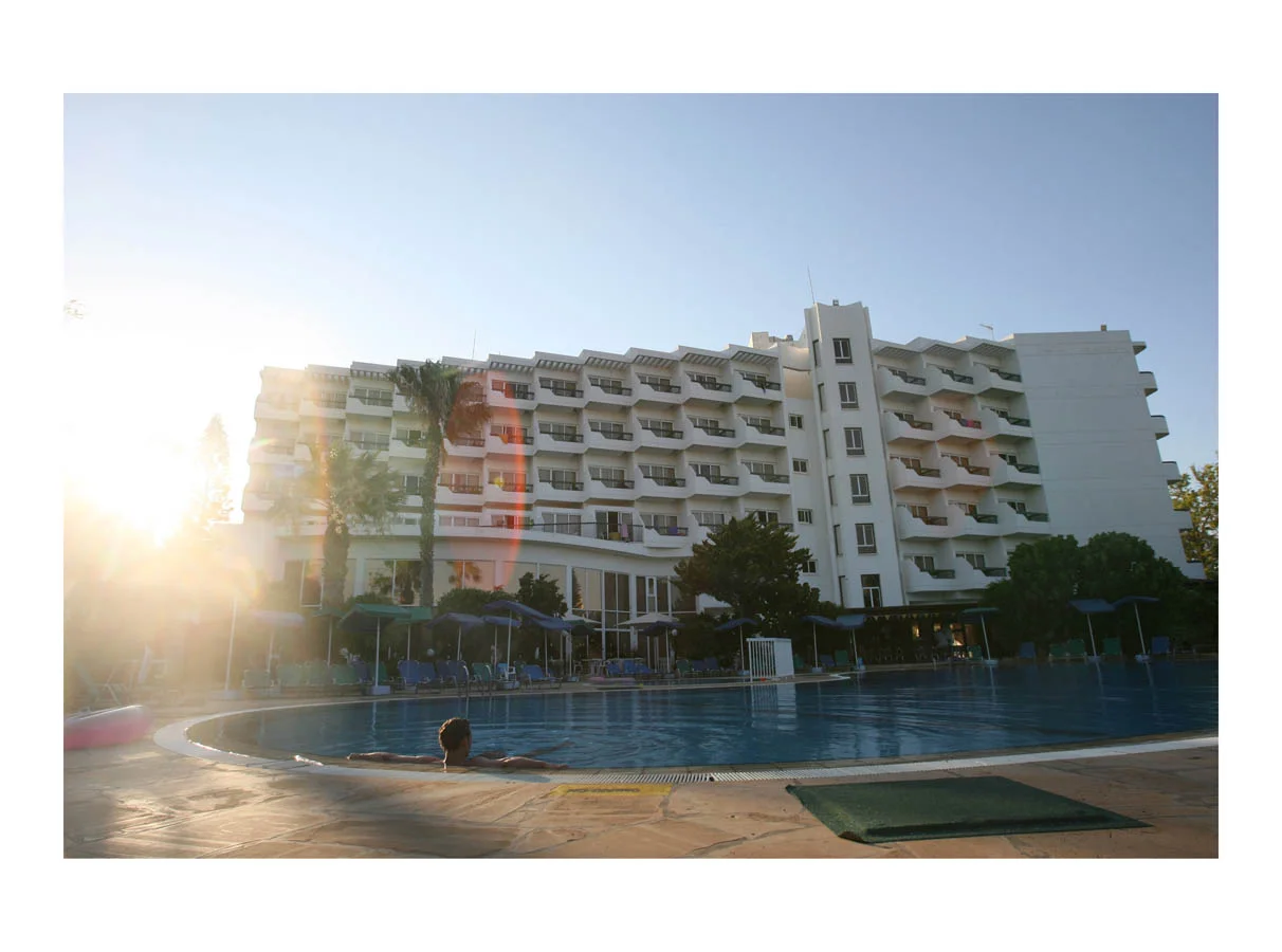 Hotel Pool (Paralimni, Cyprus, 2008) by Johnny Green (53 x 73cm) Price: £450 Size: 20.9 H x 28.7 W x 1.2 in This is the 1st of 12 Limited Edition C-type Lambda prints, encased in a beautiful gloss white ayous wood frame. The matt photograph is signed & dated en verso by the artist and has an elegant off white mount also.