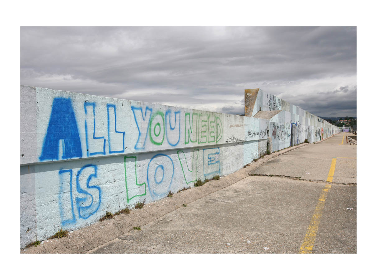   All You Need Is Love  (Baiona, Spain, 2009) by Johnny Green (53 x 73cm)   Size: 20.9 H x 28.7 W x 1.7 in   This is the 4th of 21 Limited Edition C-type Lambda prints, encased in a beautiful, black wooden frame. The matt photograph has an elegant of