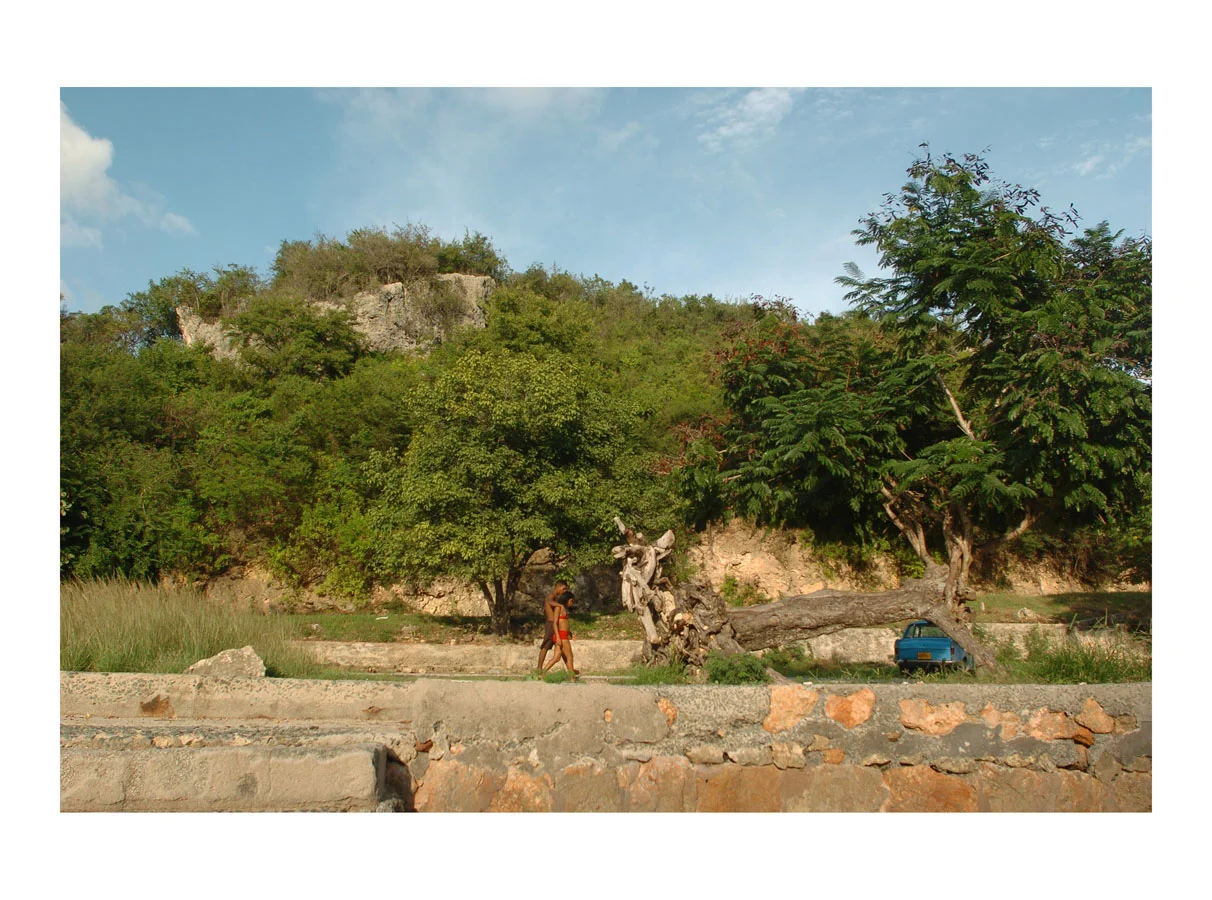 Young Love (Santiago de Cuba, Cuba, 2006) by Johnny Green (53 x 73cm) Price: £450 Size: 20.9 H x 28.7 W x 1.7 in This is the 1st of 12 Limited Edition C-type Lambda prints, encased in a beautiful, black wooden frame. The matt photograph has an elegant off white mount which is signed and numbered by the artist.