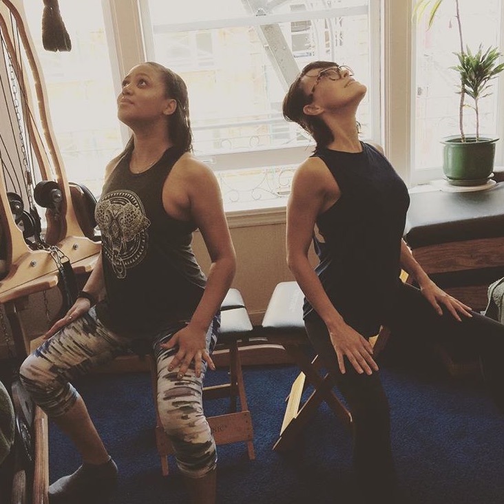Falashay (left) and Candice (right) arch and curl during their Gyrotonic certification trip to San Fransisco.