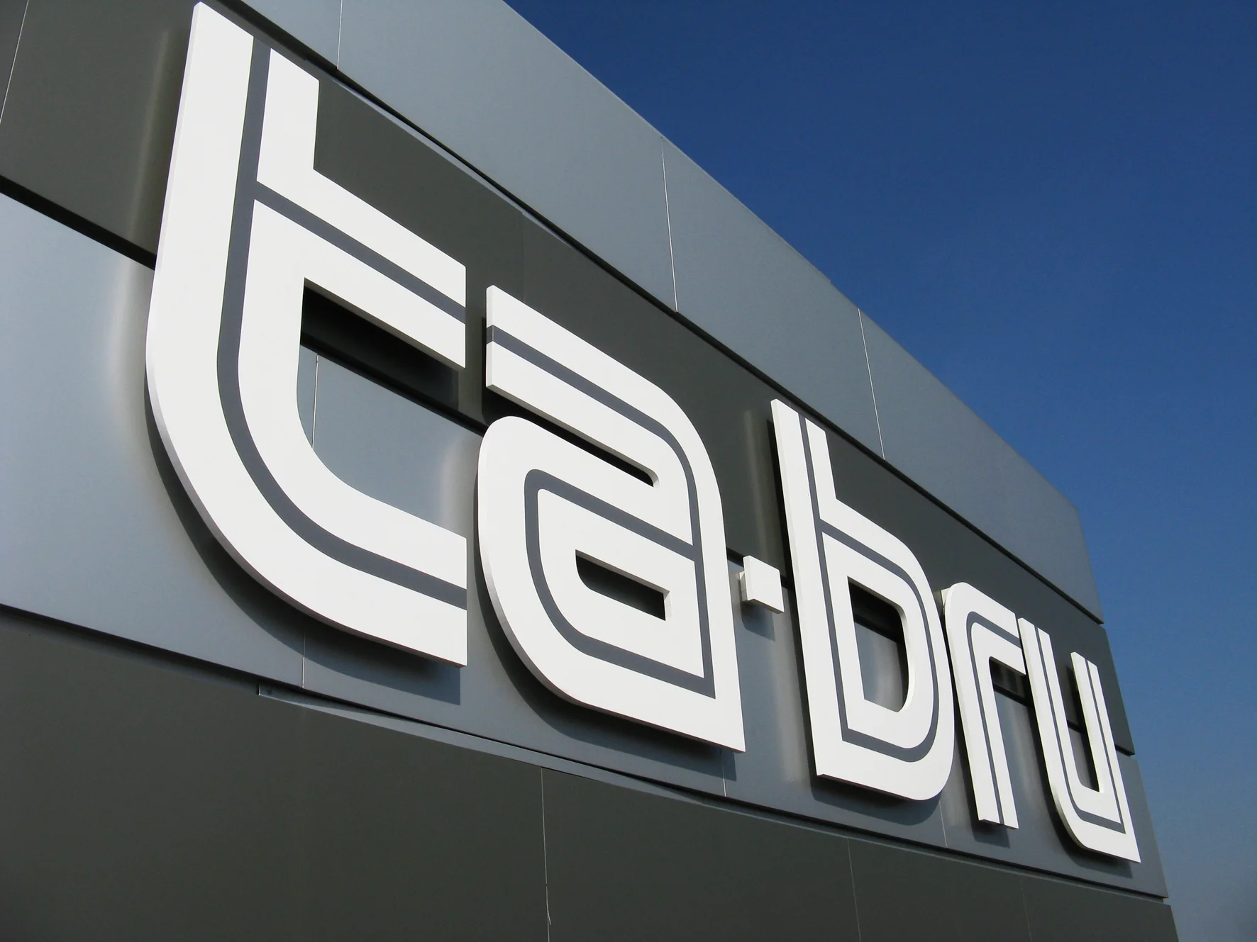 insegna lettere singole forex totem 1.JPG