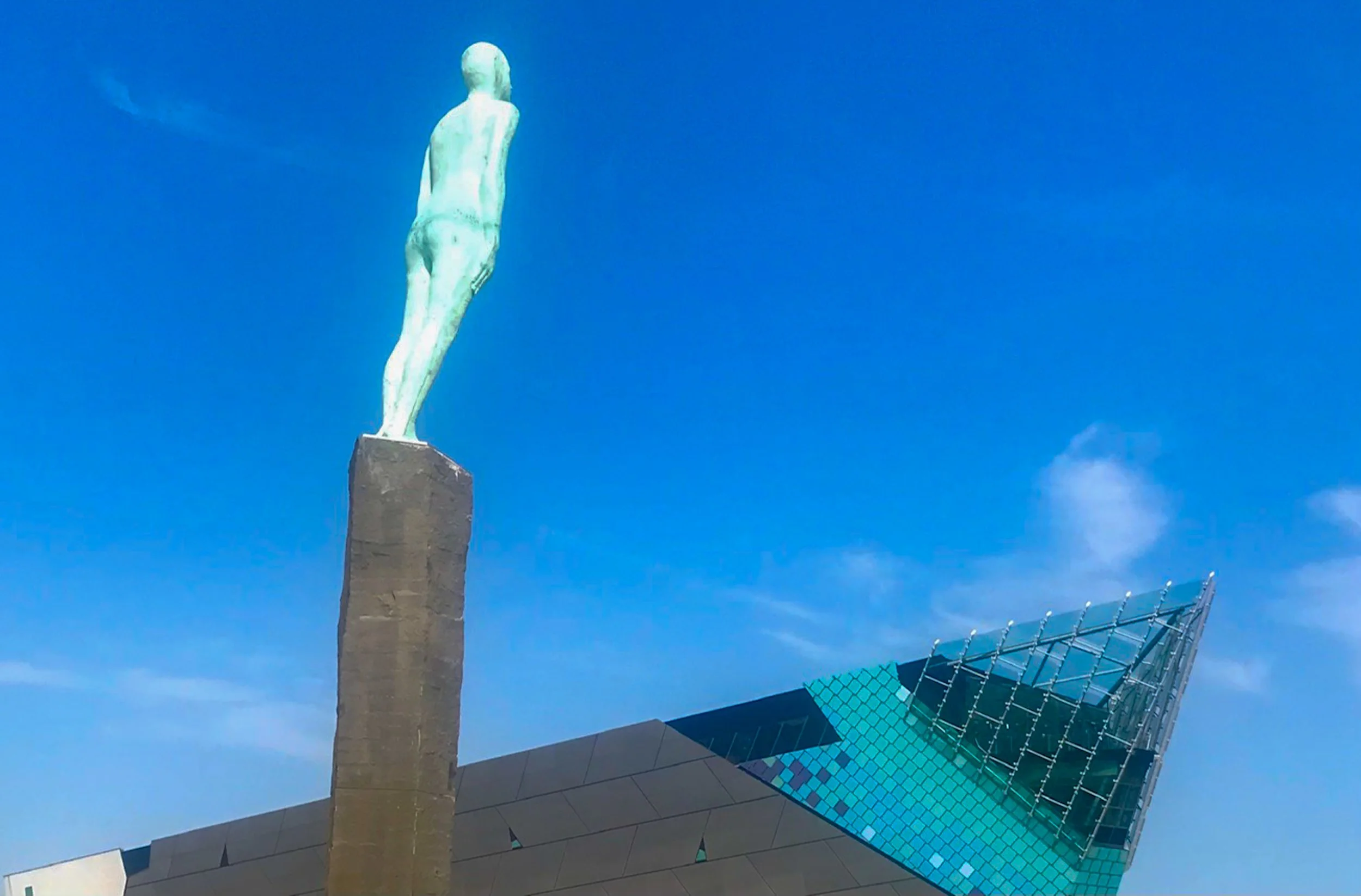 'Voyage' sculpture, the man looks across the North Sea to his identical counterpart in Iceland
