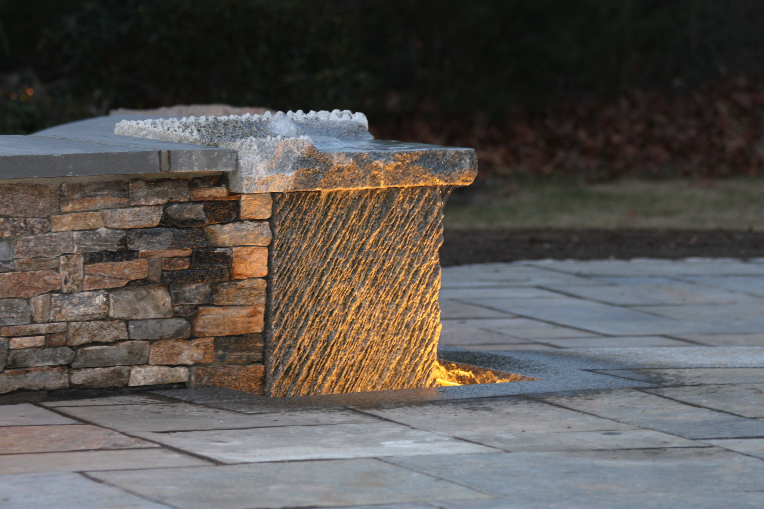 Professional landscape design with stone veneer in Laconia, NH - Mason Hollis NH