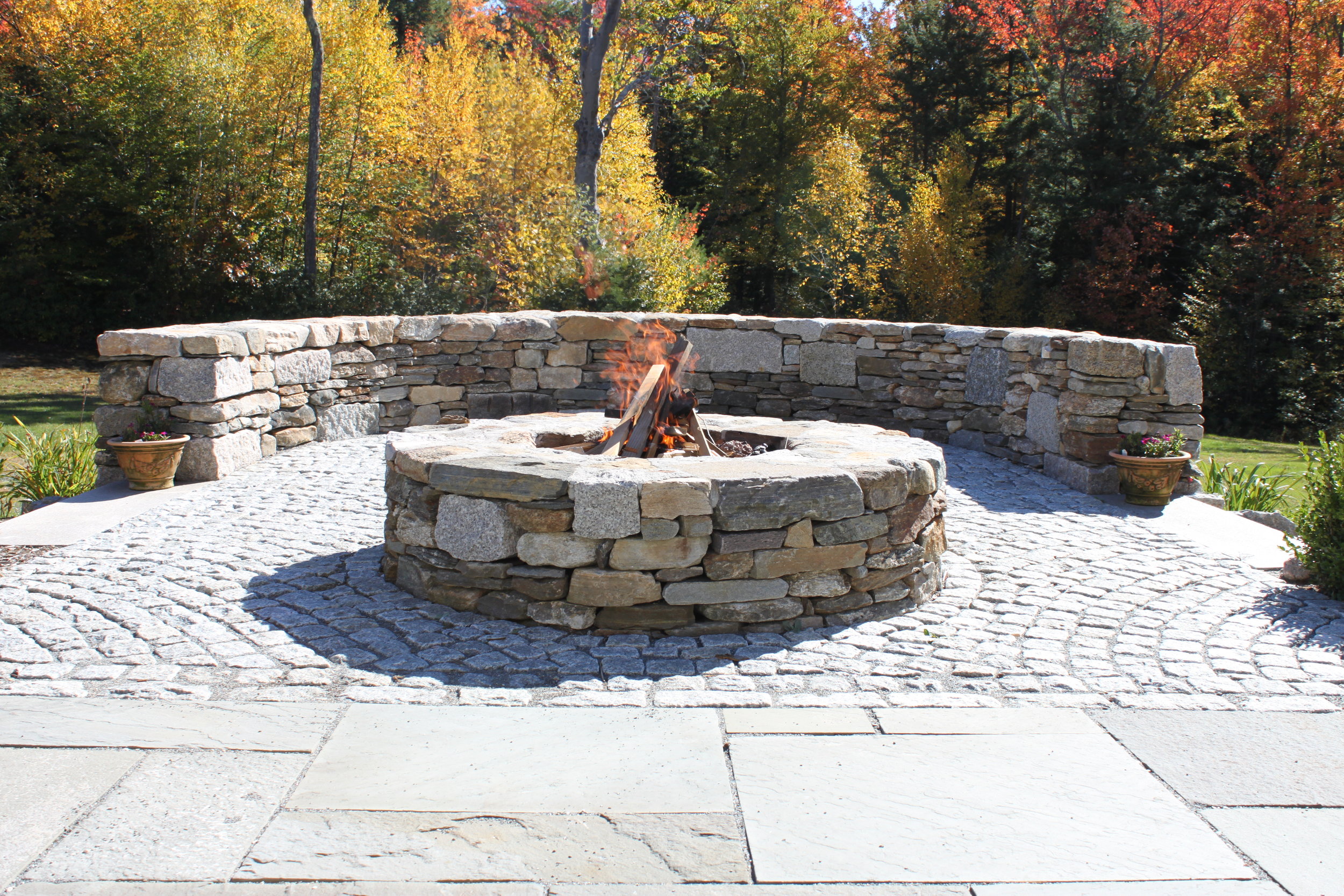 Professional outdoor fireplace design in Waltham, MA.
