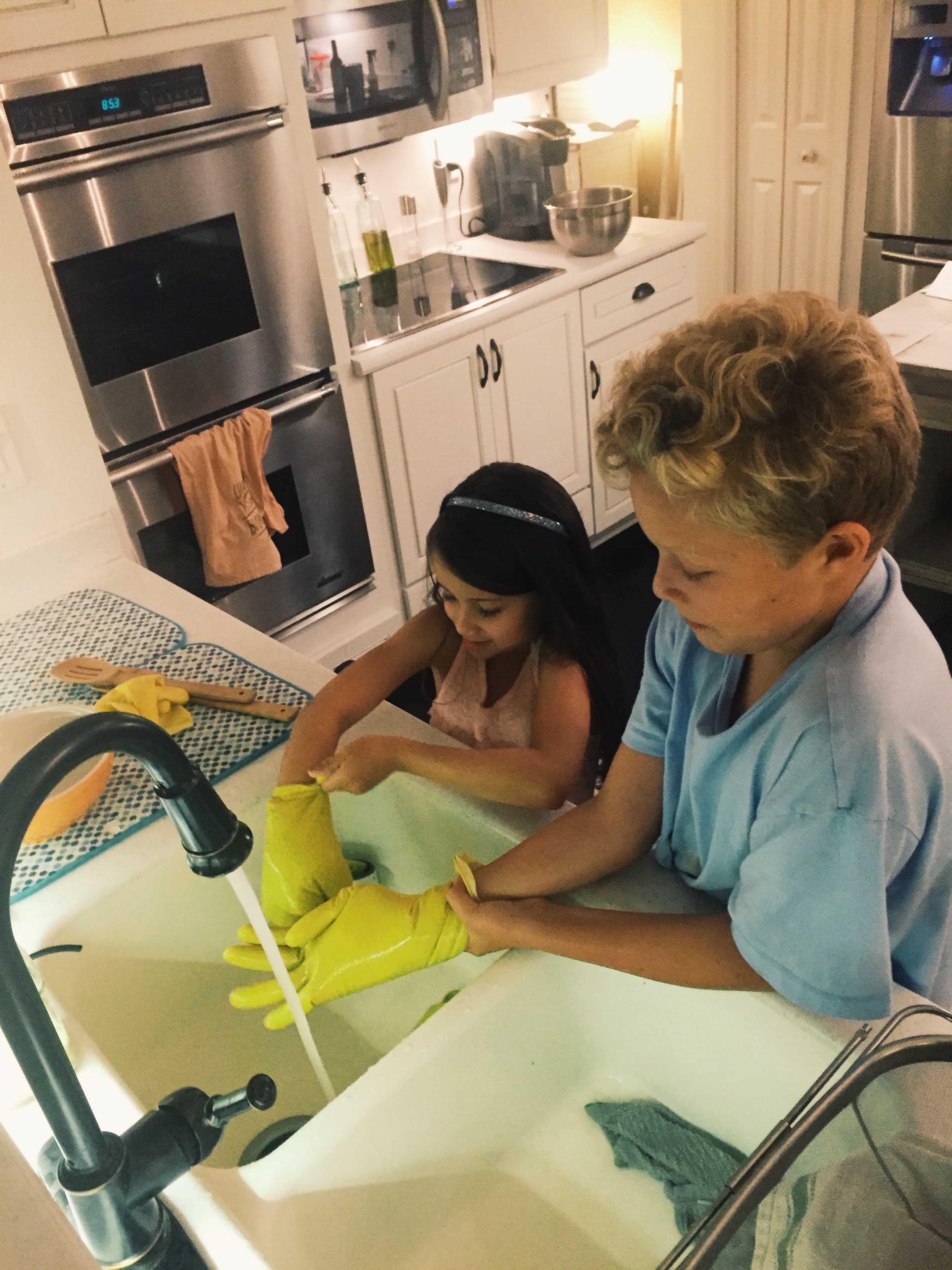 Washing dishes and yes, goofing around as well