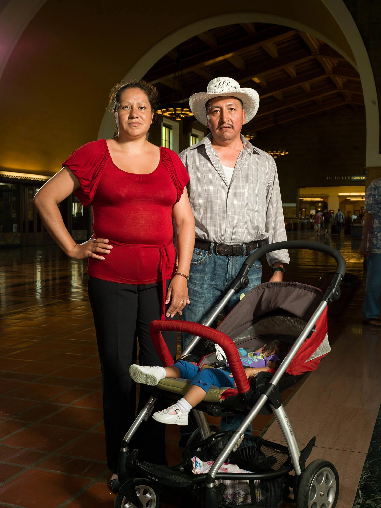 Monica Ortega, Jose Raúl Morales and daughter Joline on their way to Olvera St. August 18, 2013.