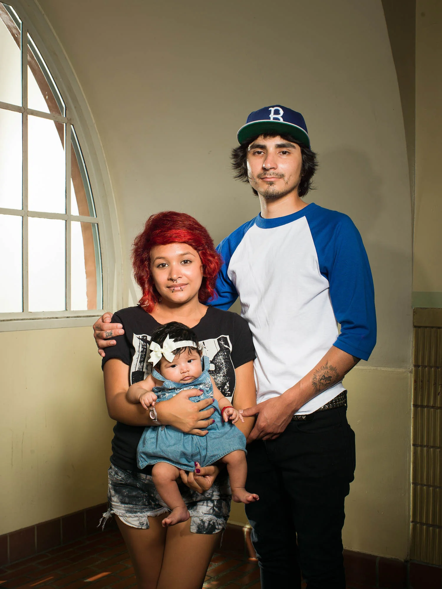 Shayla Campos, Thomas Moore and daughter Leia. August 16, 2013.