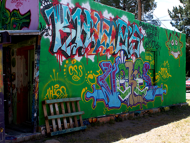 (Across from) 402 W. Court Court Youth Center Installation - Open Space for Graffiti Art Acrylic/Spray Paint/Sculpture Multiple Artists 2009 - Present