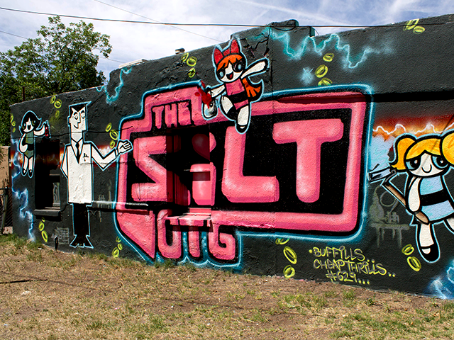 (Across from) 402 W. Court Court Youth Center Installation - Open Space for Graffiti Art Acrylic/Spray Paint/Sculpture Multiple Artists 2009 - Present