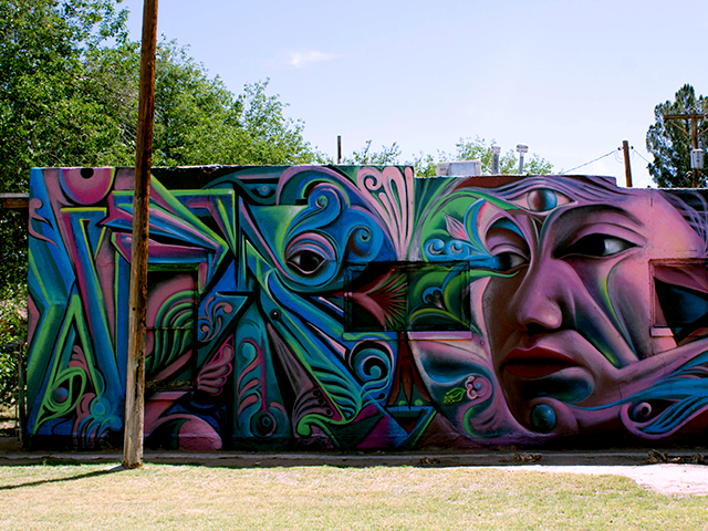 (Across from) 402 W. Court Court Youth Center Installation - Open Space for Graffiti Art Acrylic/Spray Paint/Sculpture Multiple Artists 2009 - Present