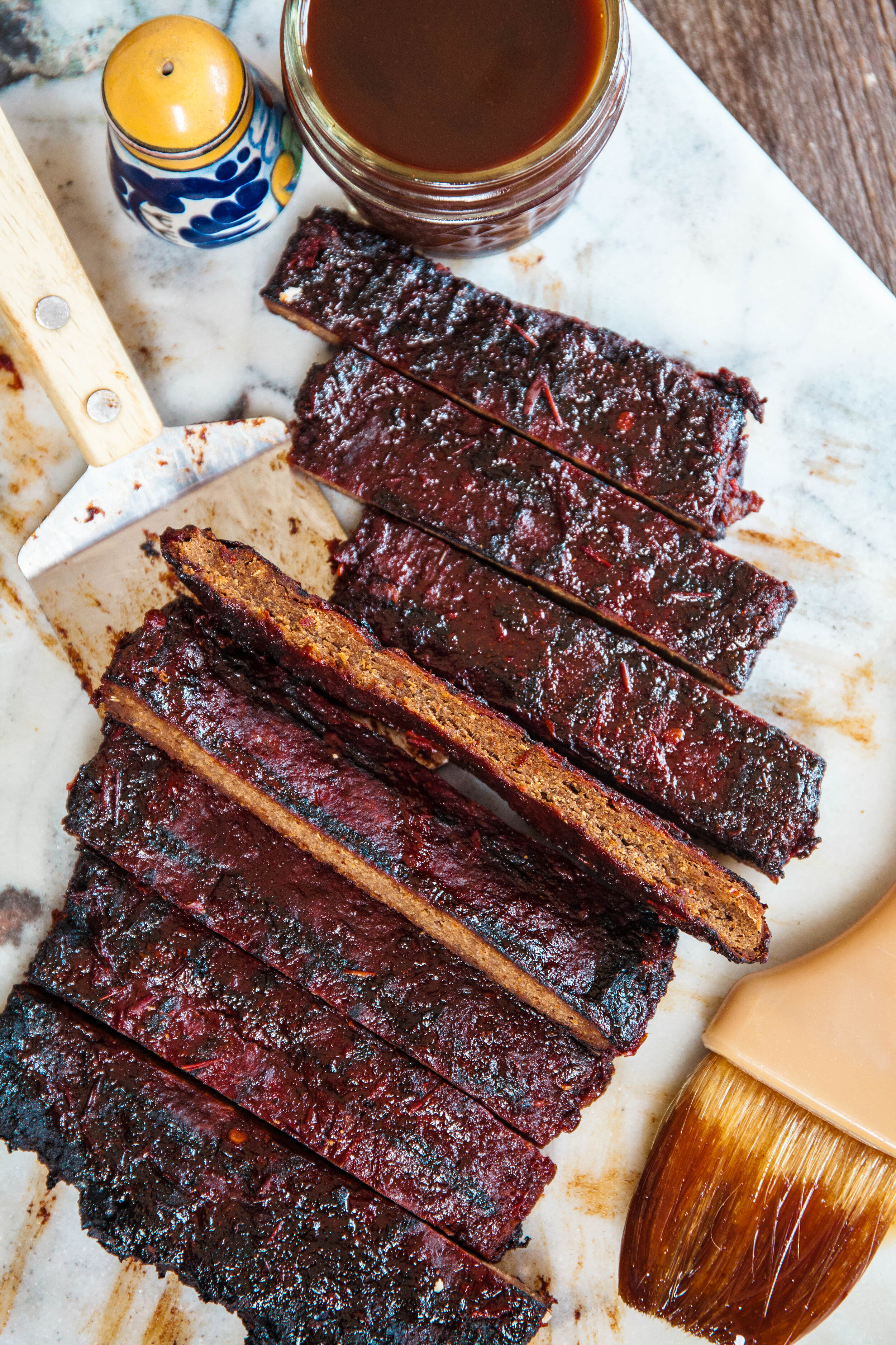 SMOKEY CHOCOLATE BBQ, SEITAN RIBS from The Mello Cookbook. Available in a soft cover physical copy and digital E-book.
