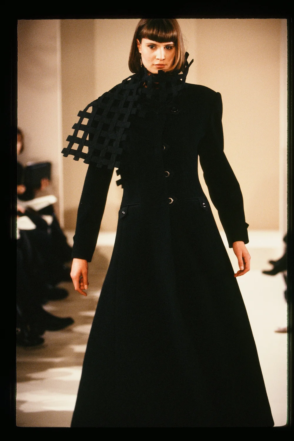 4 1994 show anouk in long blk coat copy.jpg