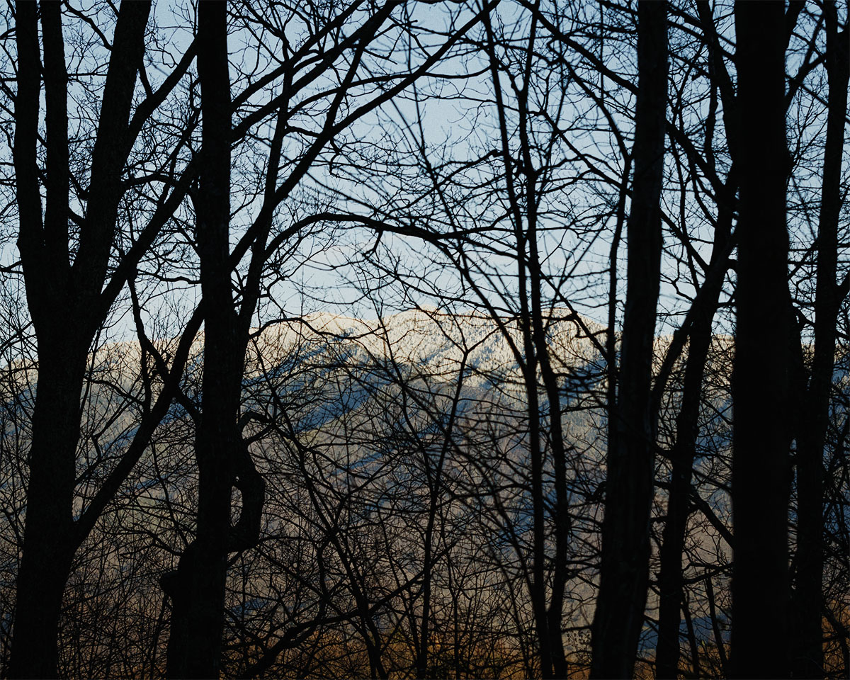 I was there in the very early spring, when the mountain tops were still getting snow and there were no leaves on the trees yet.