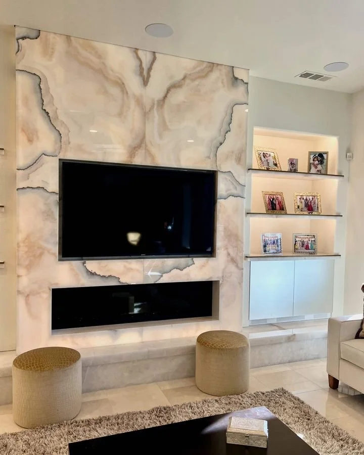 Onyx slabs are a stunning focal point, adding natural beauty, a sense of luxury and timeless elegance.  Interior Design: SMDAInc