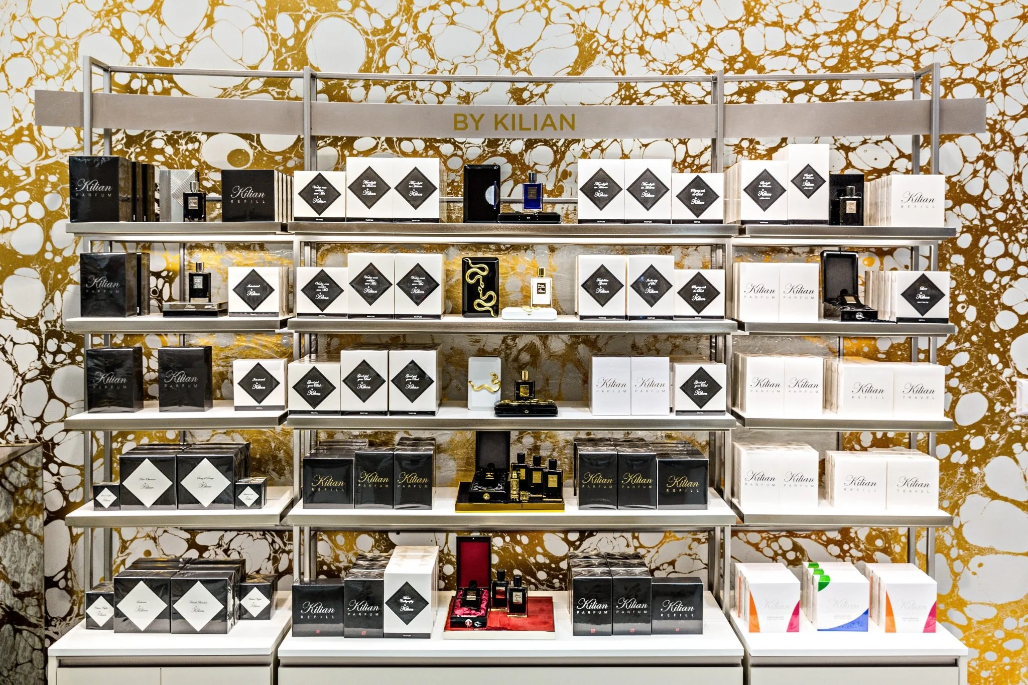 Saks Fifth Avenue - Brickell City Center, Miami Shown: Calico Wabi Cloud Wallpaper