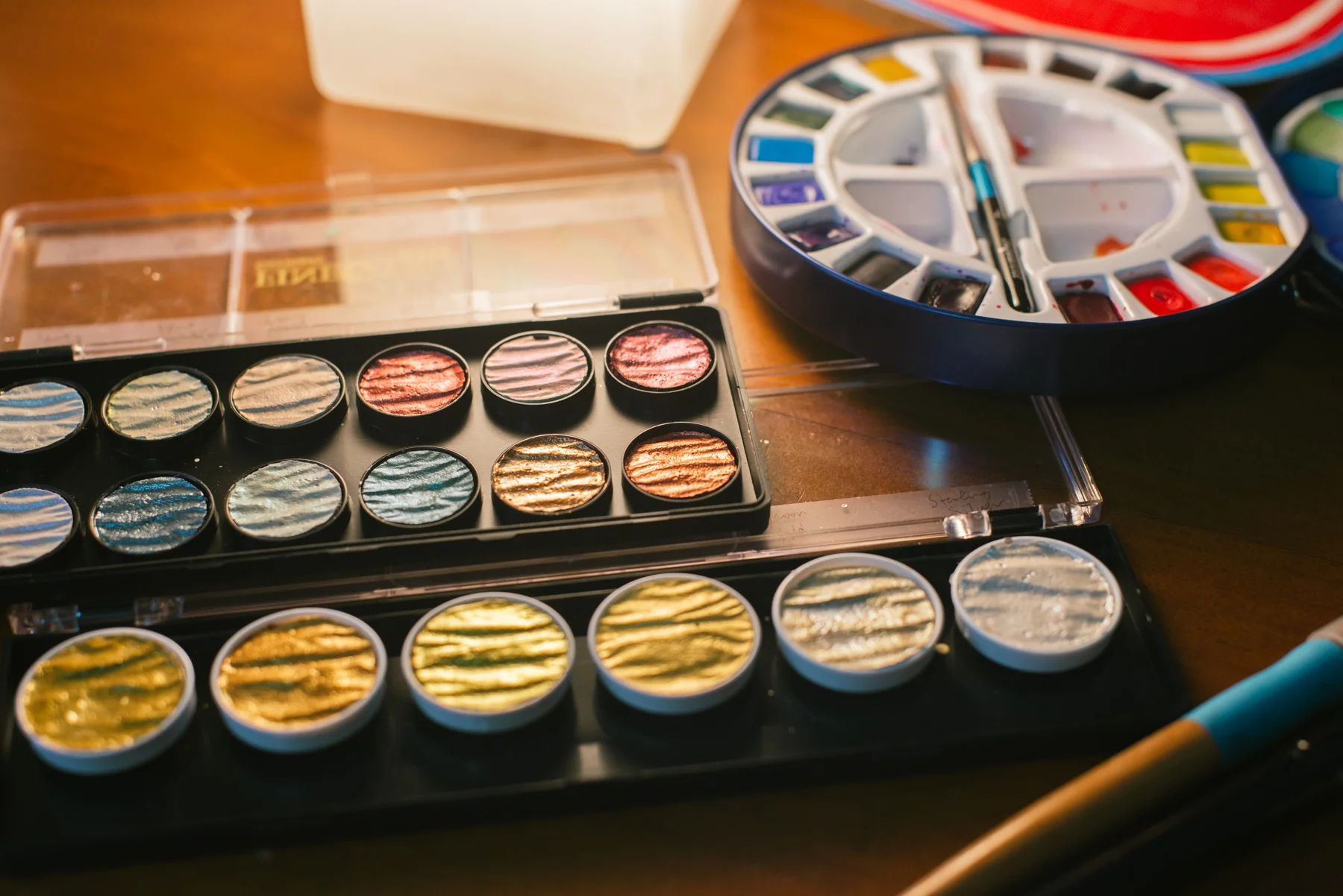 Finetec and watercolour palettes.