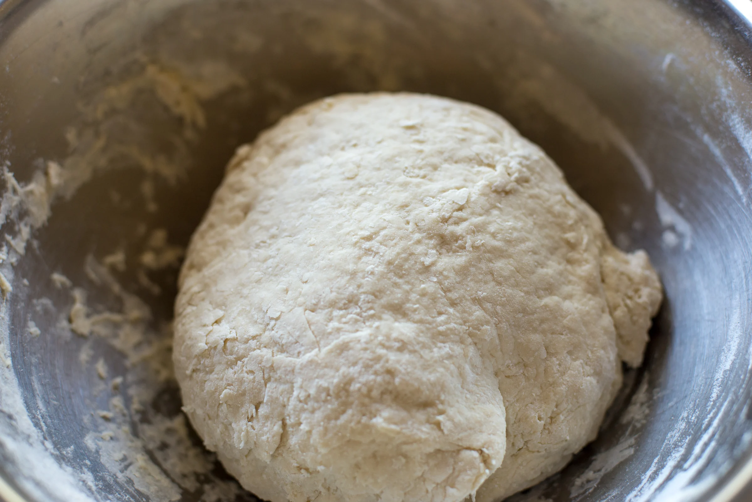 Mixed five and a half cups of flour with 2 cups of water into the leaven sludge.