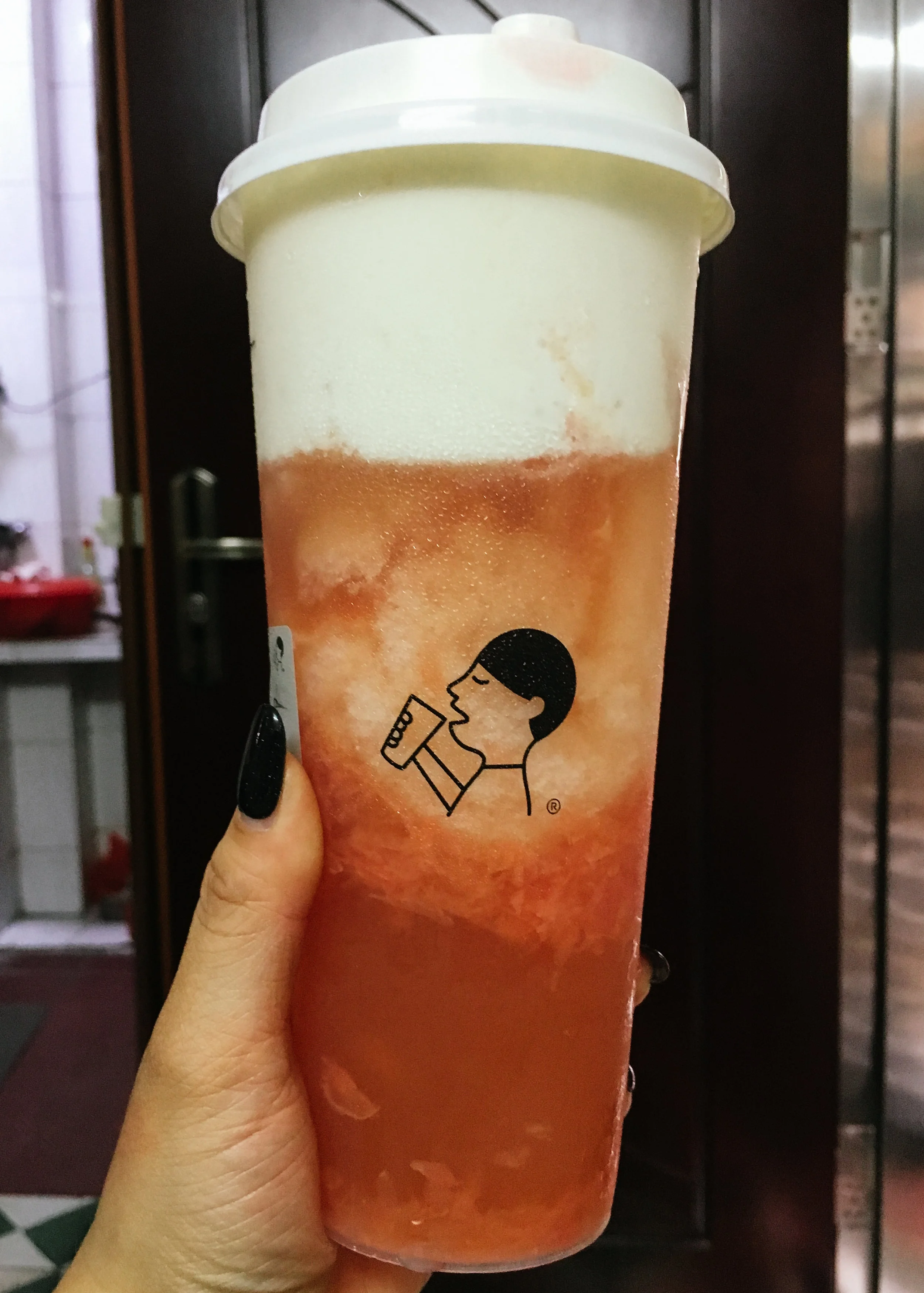 A drink my ...sister in law (???) (I don't know what I call her) got me. Grapefruit tea at the bottom, some slushy in the middle then a cheese foam on top.