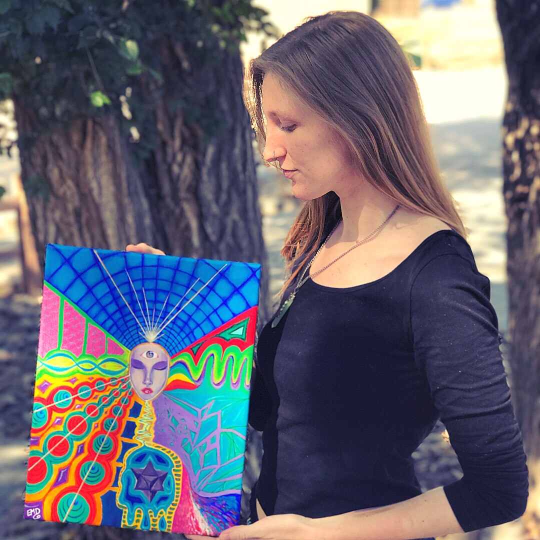 Me holding my “development” painting, acrylic on canvas.