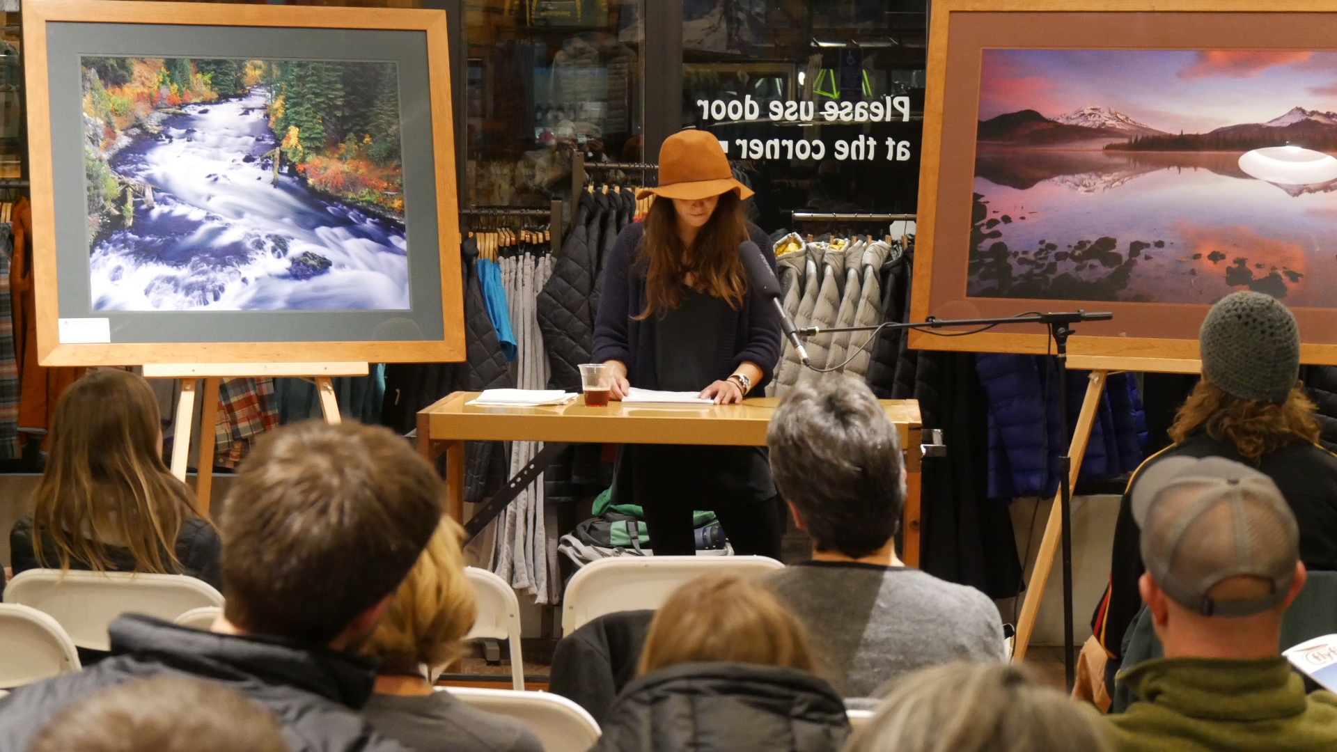 Me avoiding eye contact and also wishing I'd brought more beer onstage while reading at the Writer's on the Fly tour stop in Bend, Oregon.