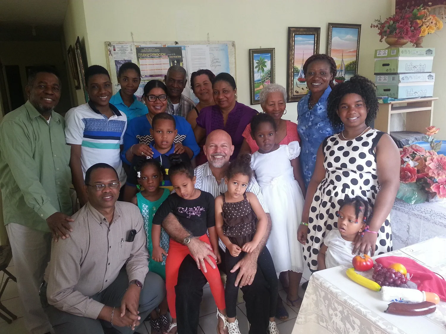 IAM community gathering with children, families, and volunteers