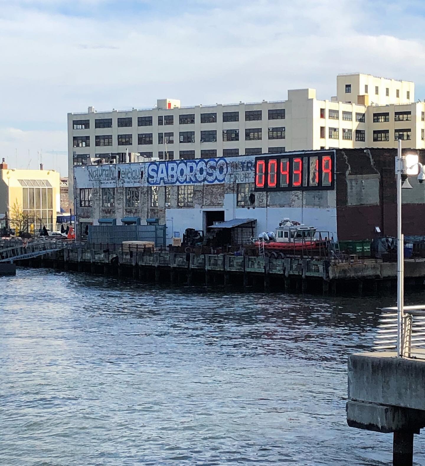 The official countdown to the end of the Trump presidency as seen from @nyc_ferry this morning.

Digital clock by artist @bstosuy and others. 

#byedon