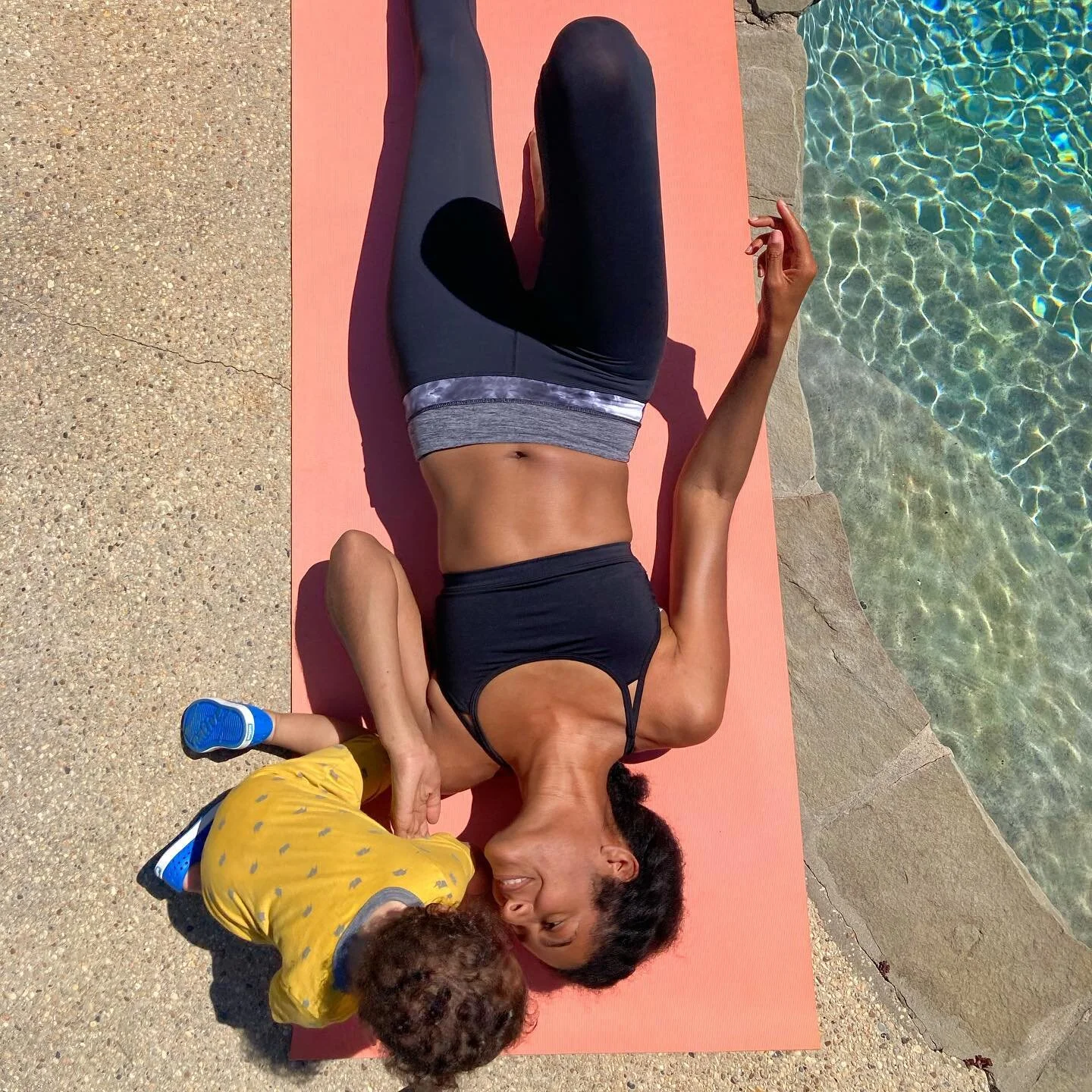 Working out, like everything else, takes longer when you have a busy toddler by your side 😂. 
.
.
.
.
.
.
.
.
.
.
.
.
#themindfulnook #mindfulparenting #yogamat #yogamama #outdooryoga #yogaoutside #blackgirlyoga #blackyogis #blackyogi #yogawithourki