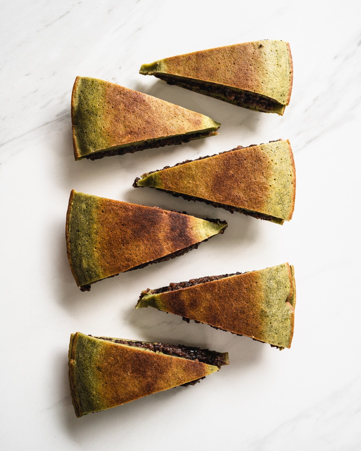 Apam balik, ban chang kuih, min chiang kueh (面煎粿), martabak manis... This Southeast Asian pancake, classically filled with peanuts or creamed corn, has as many names as there are cultures that eat it.
 
But what if I give it a green tea (matcha) ting