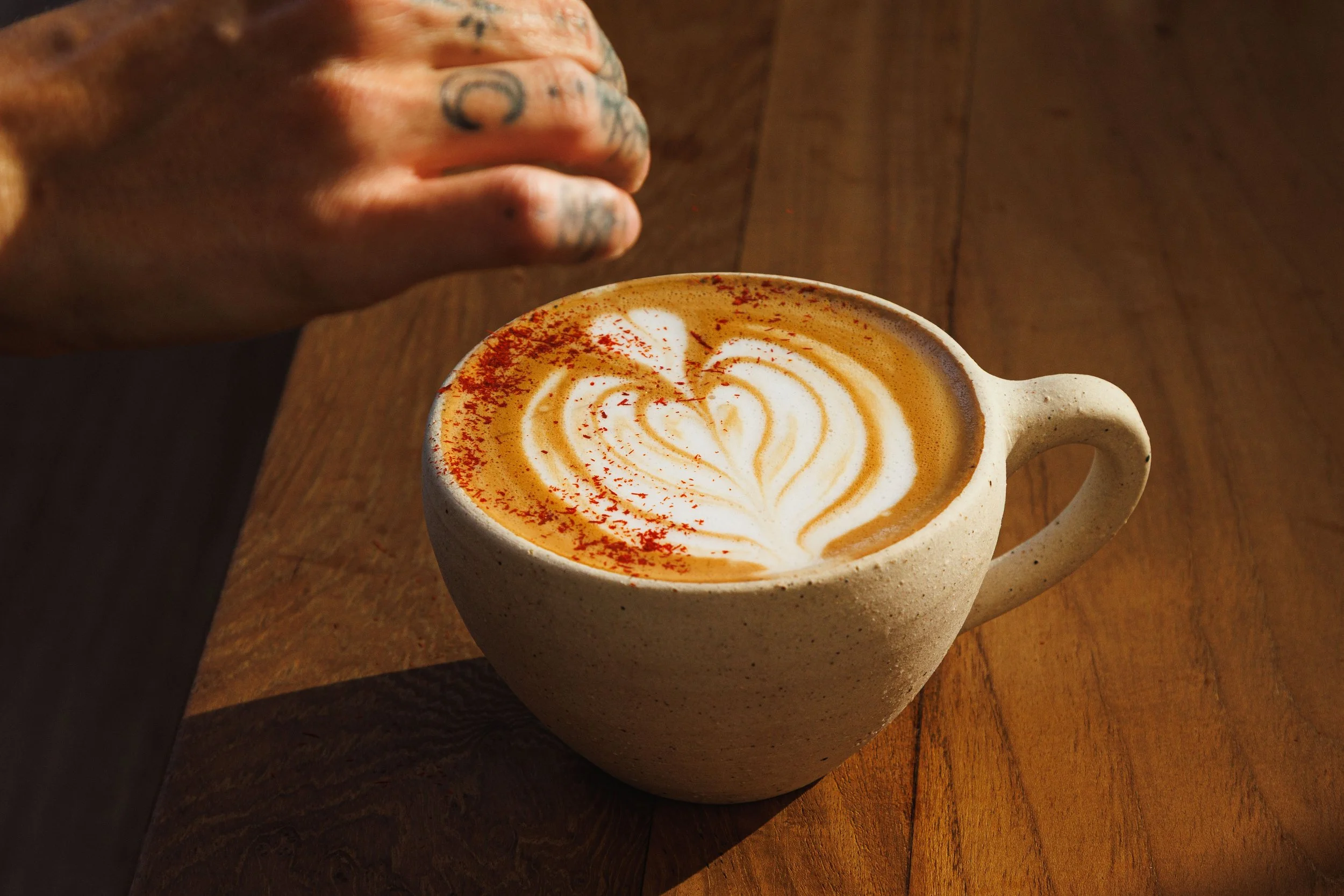 Commercial photo of saffron coffee in a cafe in San Diego.