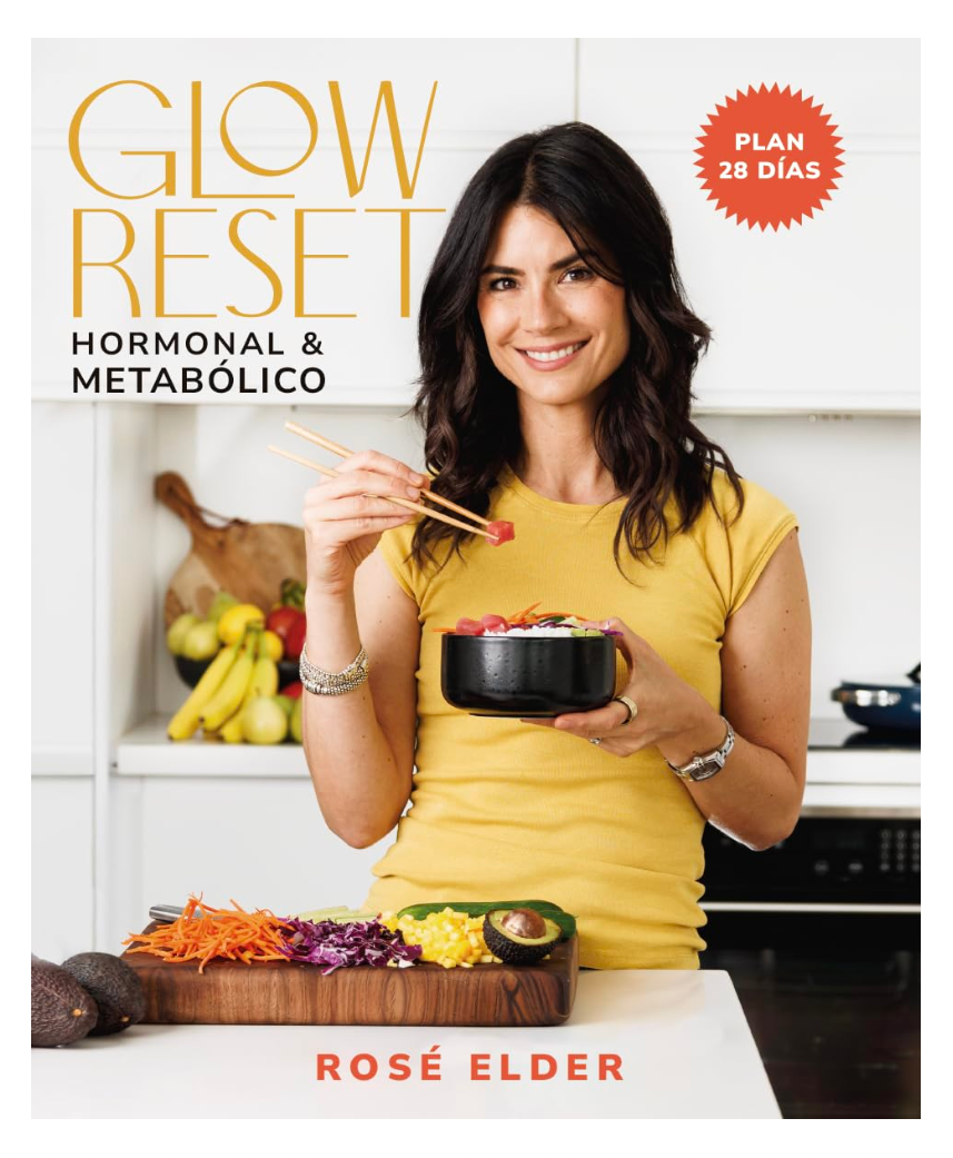 Cookbook cover of a model eating a poke bowl with healthy ingredients around her in a styled white kitchen. Shot by San Diego based editorial food & lifestyle photographer Amy Carson.