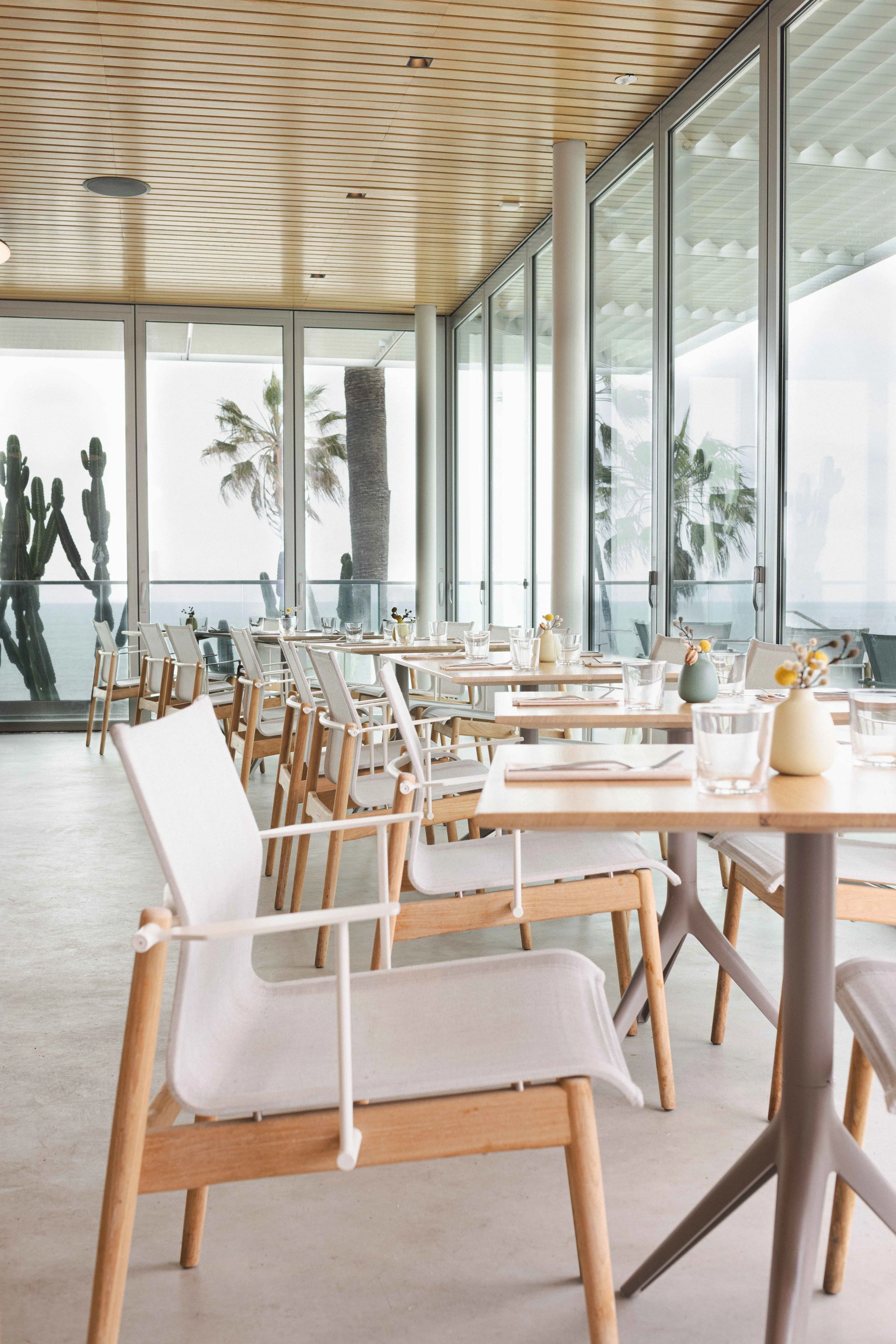 Commercial photo of natural light dining room interiors by commercial photographer Amy Carson in San Diego.