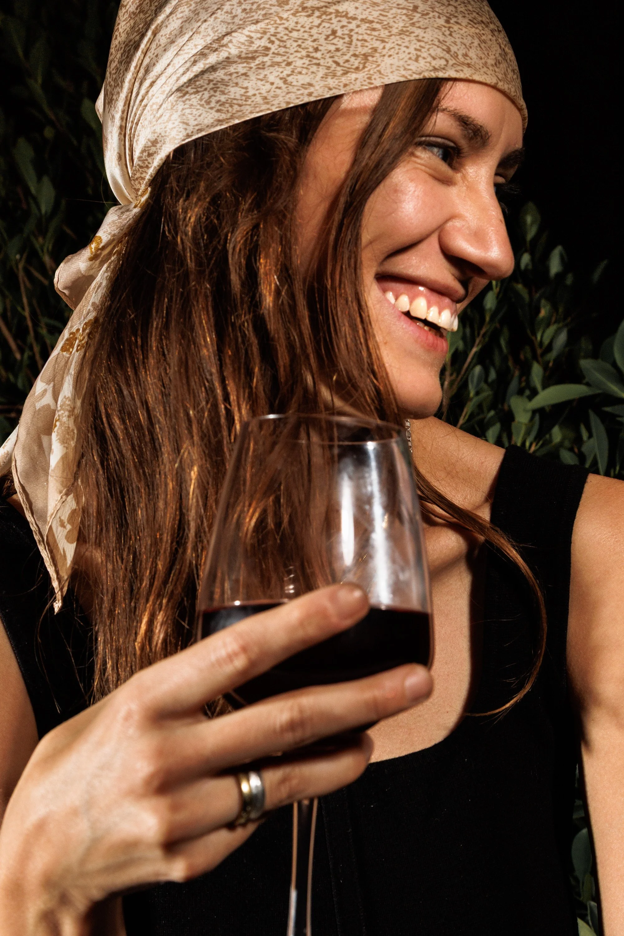 Commercial lifestyle beverage photo of a woman drinking wine. By Amy Carson.