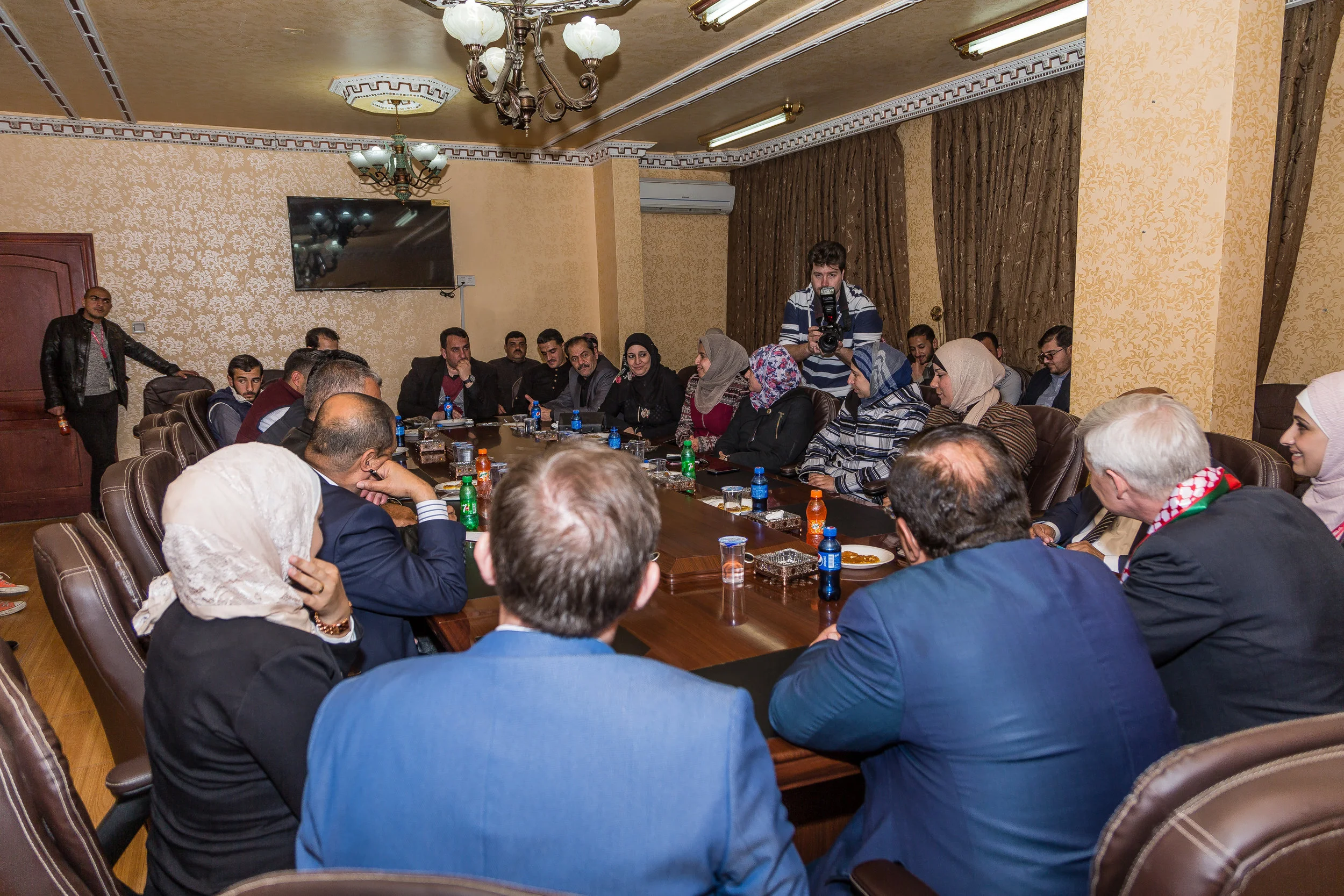 A Wide photograph in Ma'an by Jordan Photographer Rashad Aabtawi of the town hall meeting in Ma'an