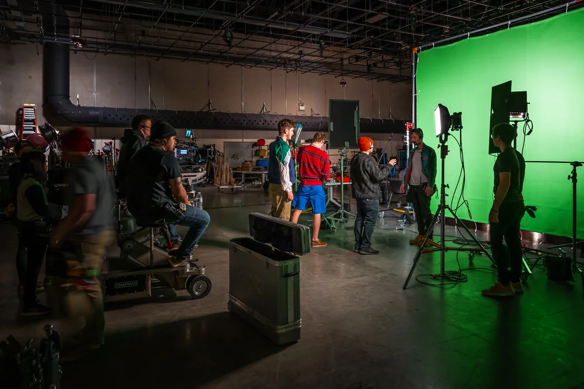 A wide Set Photograph by Chicago Set Photographer Rashad Anabtawi of the Green Screen Setup with the camera crew on the Sound stage