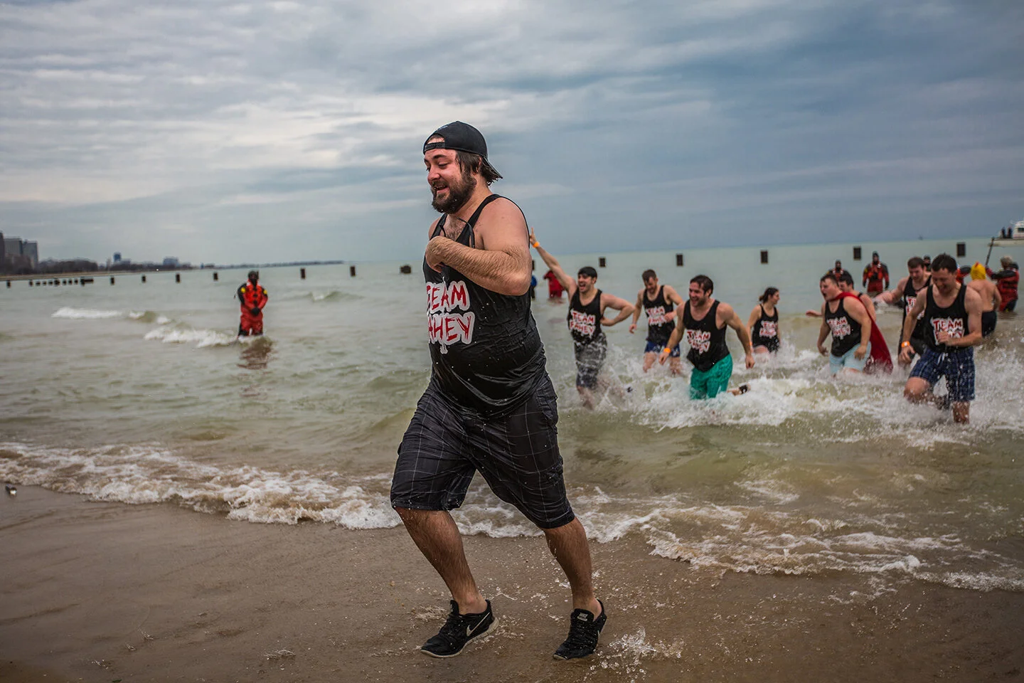 Photograph of a participant running in The 2017 Chicago Polar Plunge by Chicago Photographer Rashad Anabtawi