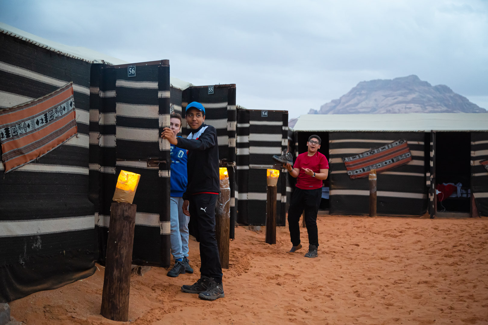 Photograph of the Students entering their tents in the Wadi Rum Campsite in Jordan by Jordan Photographer Rashad Anabtawi