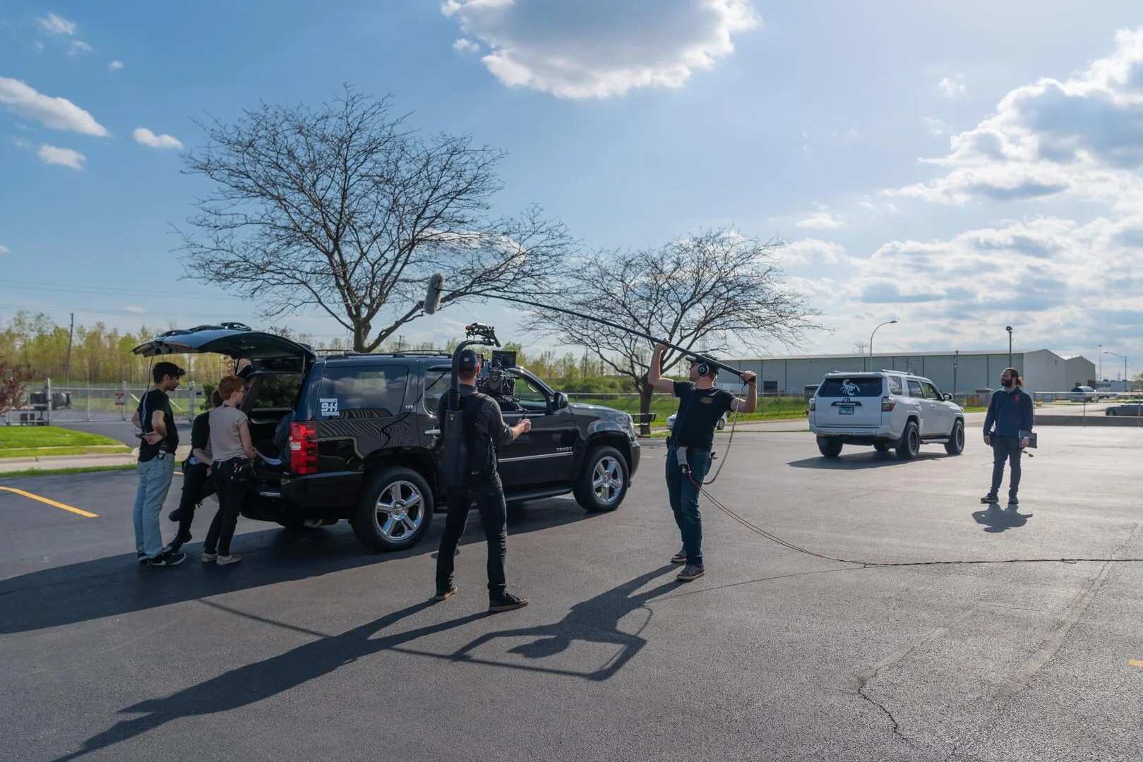 Wide Behind Unit Still Image by Chicago set photographer Rashad Anabtawi of the Car action Scene