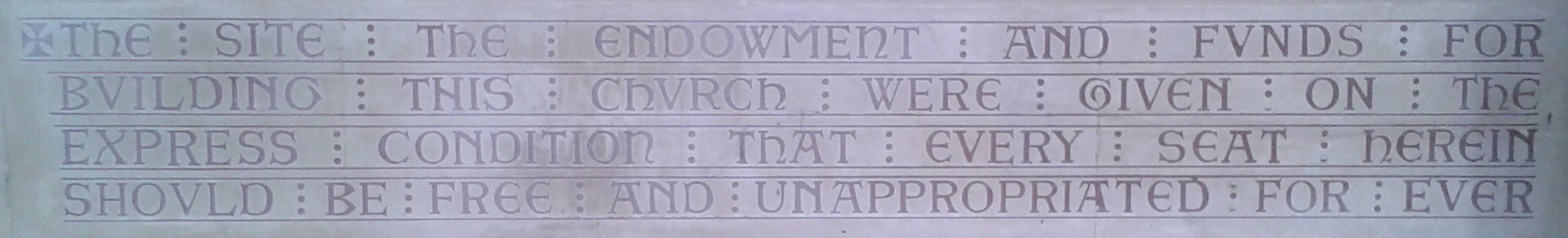 Inscription in the porch at St Peter's.