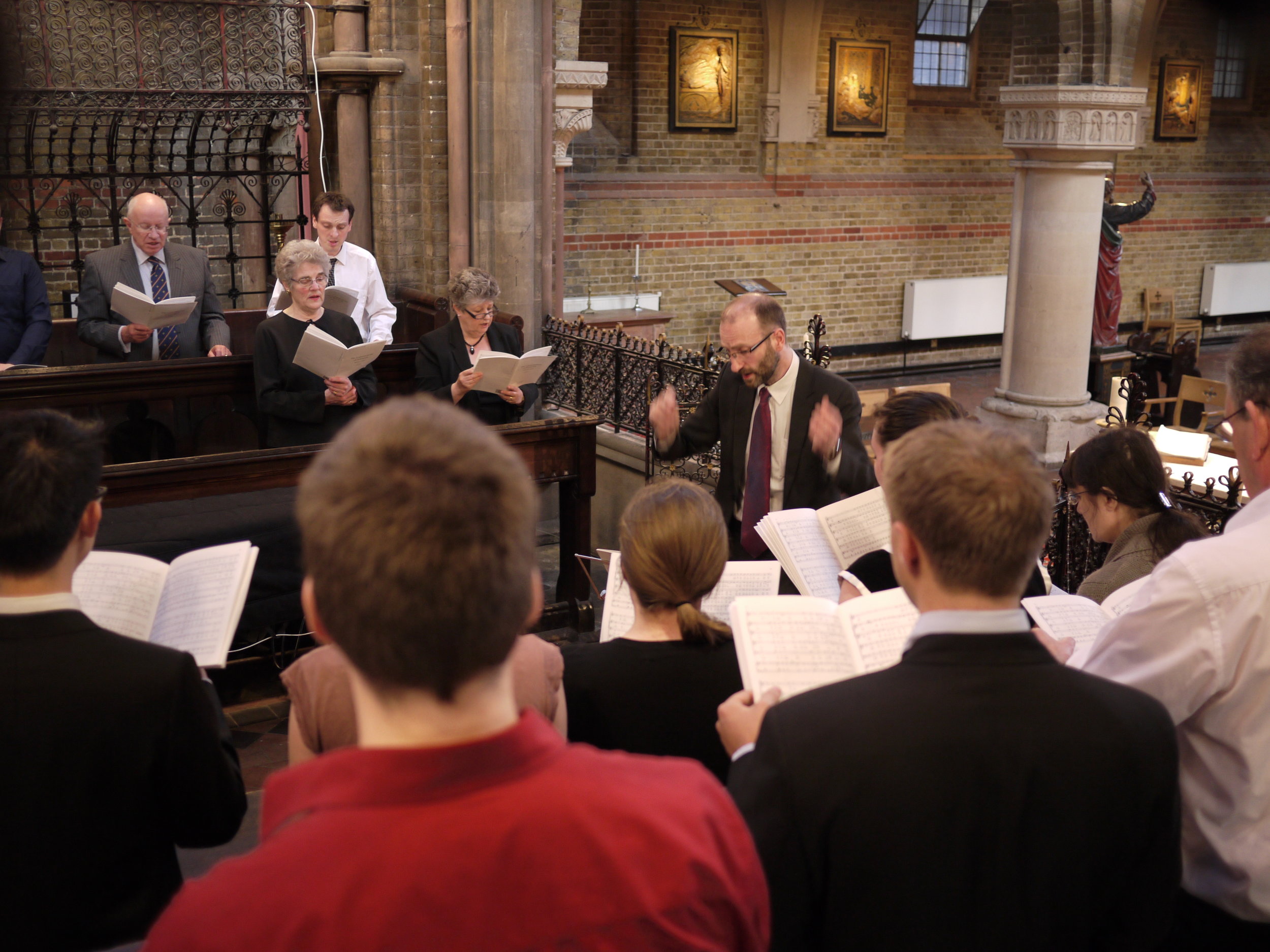 The St Peter's Singers rehearse for a choral service.