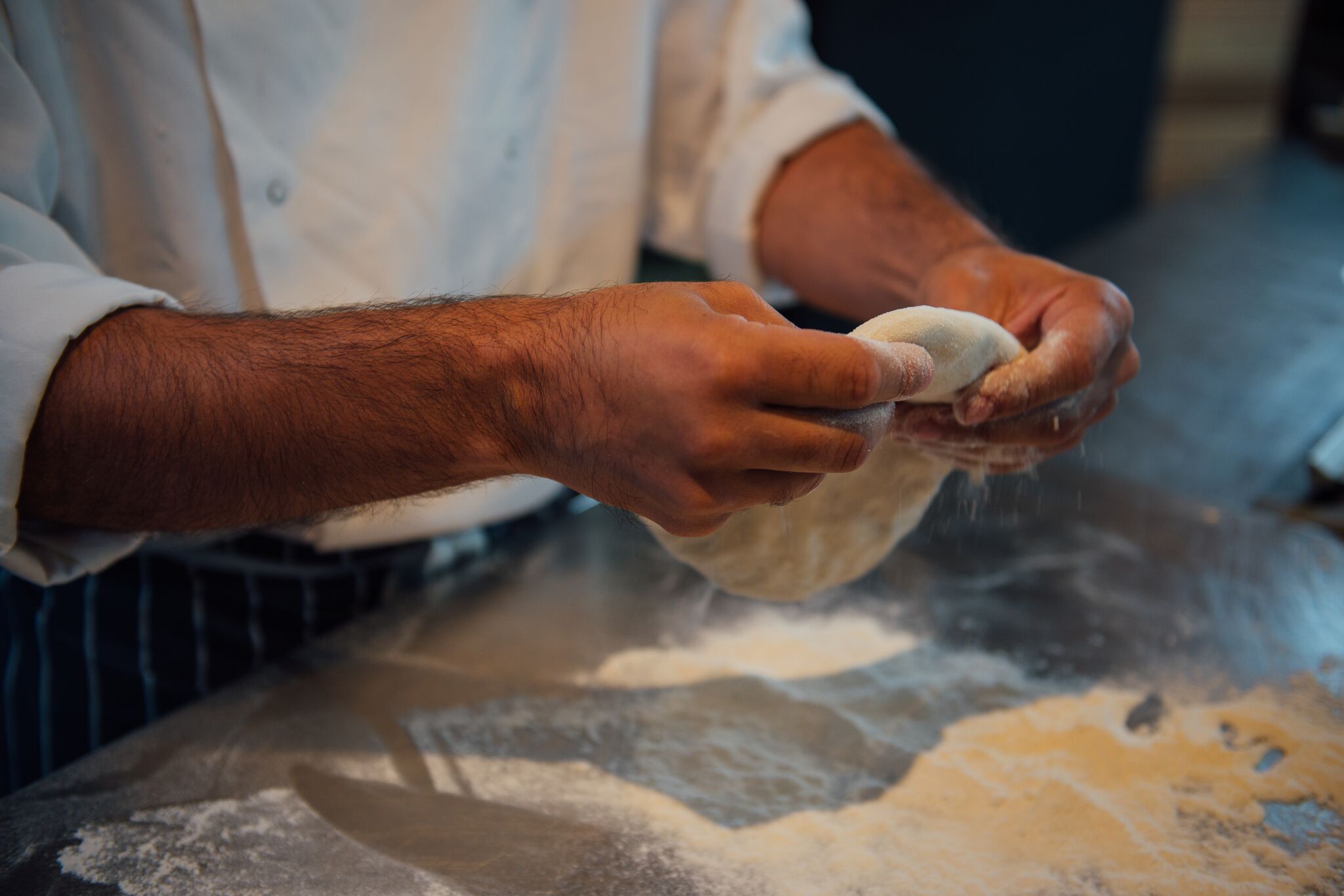 Red Lion Kitchen Chefs Hands w: Dough.jpg