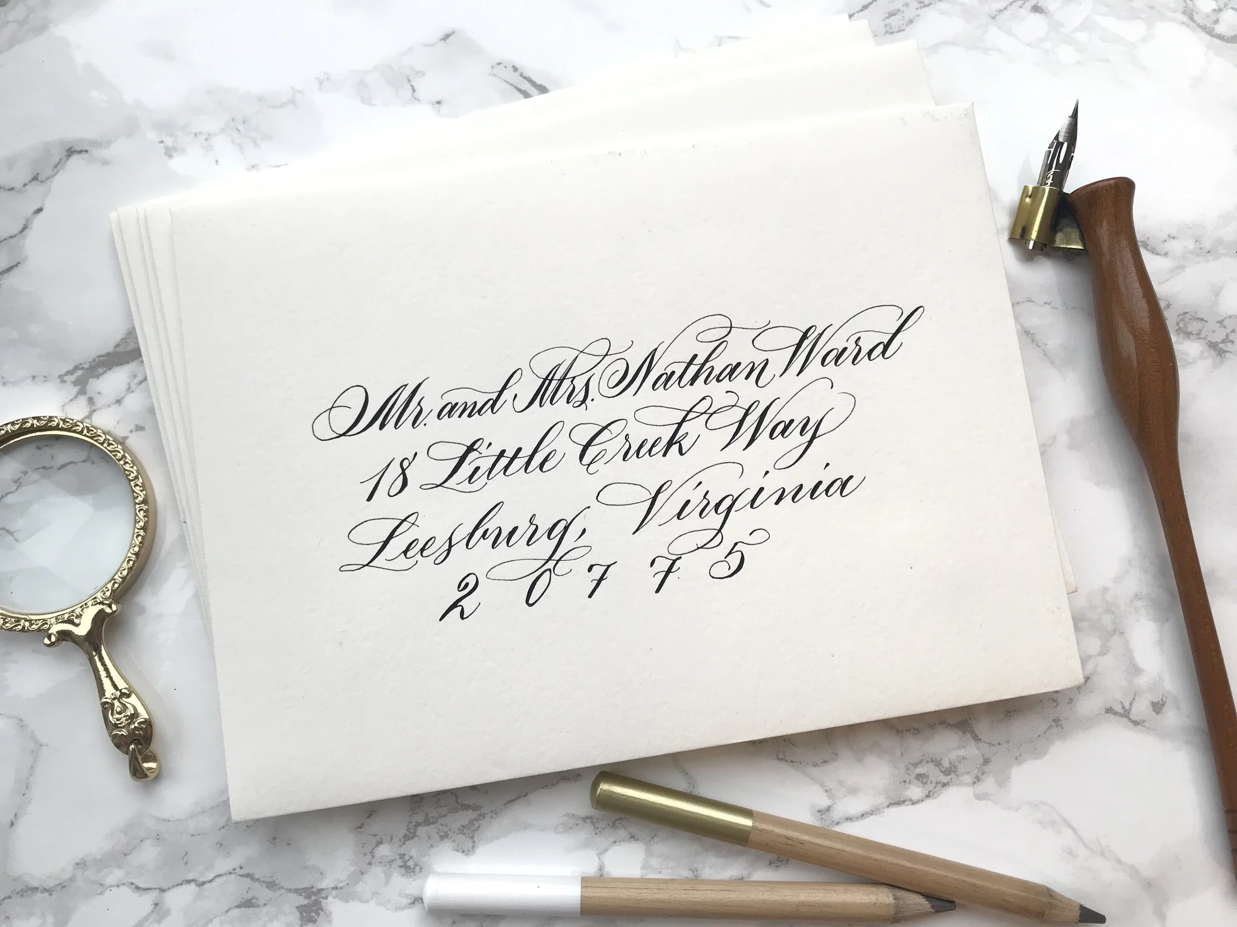 Hand-addressed wedding envelopes in copperplate calligraphy, tri-state area.jpg