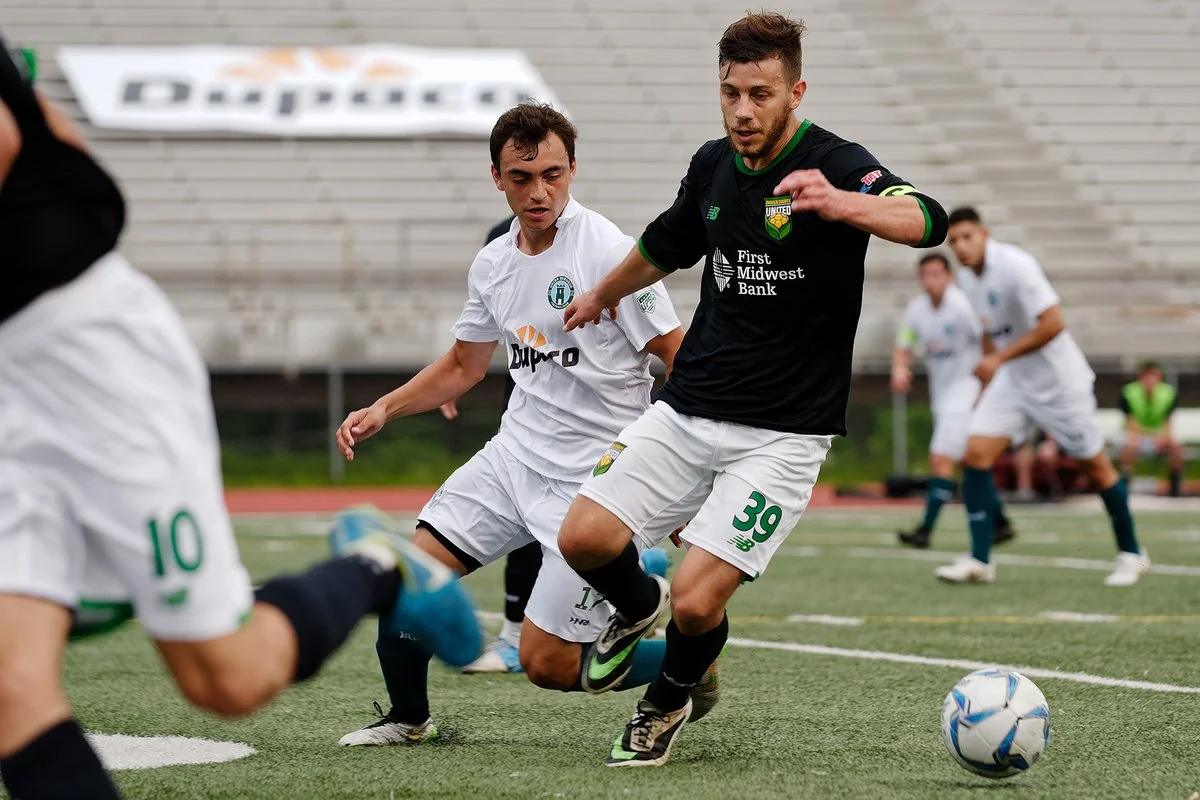 Union winger Antonio Sanchez contends with DeKalb forward Colby Newquist. PC: Stephen Packer